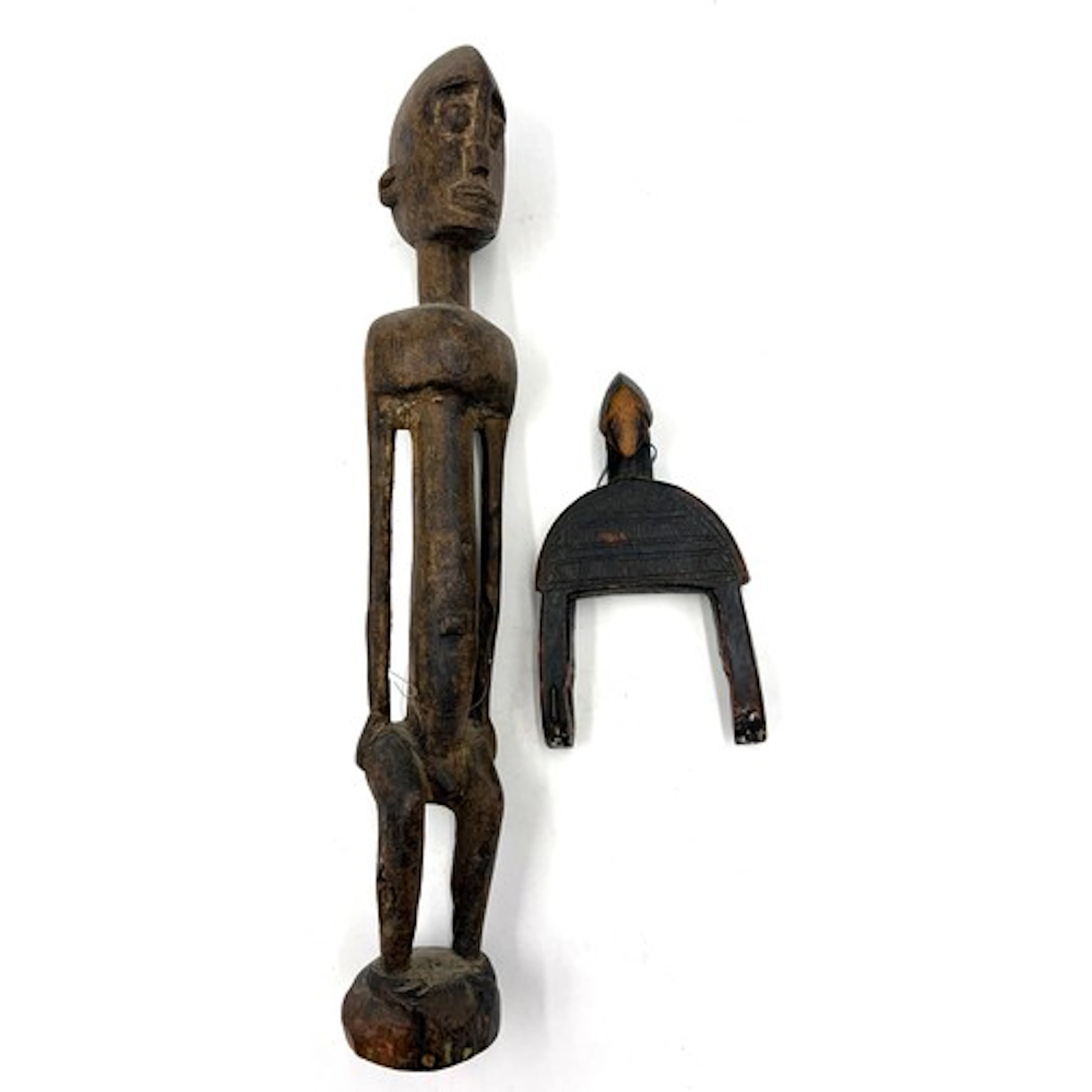 A early to mid 20thC wooden Senufo figure 42cm h together wi...