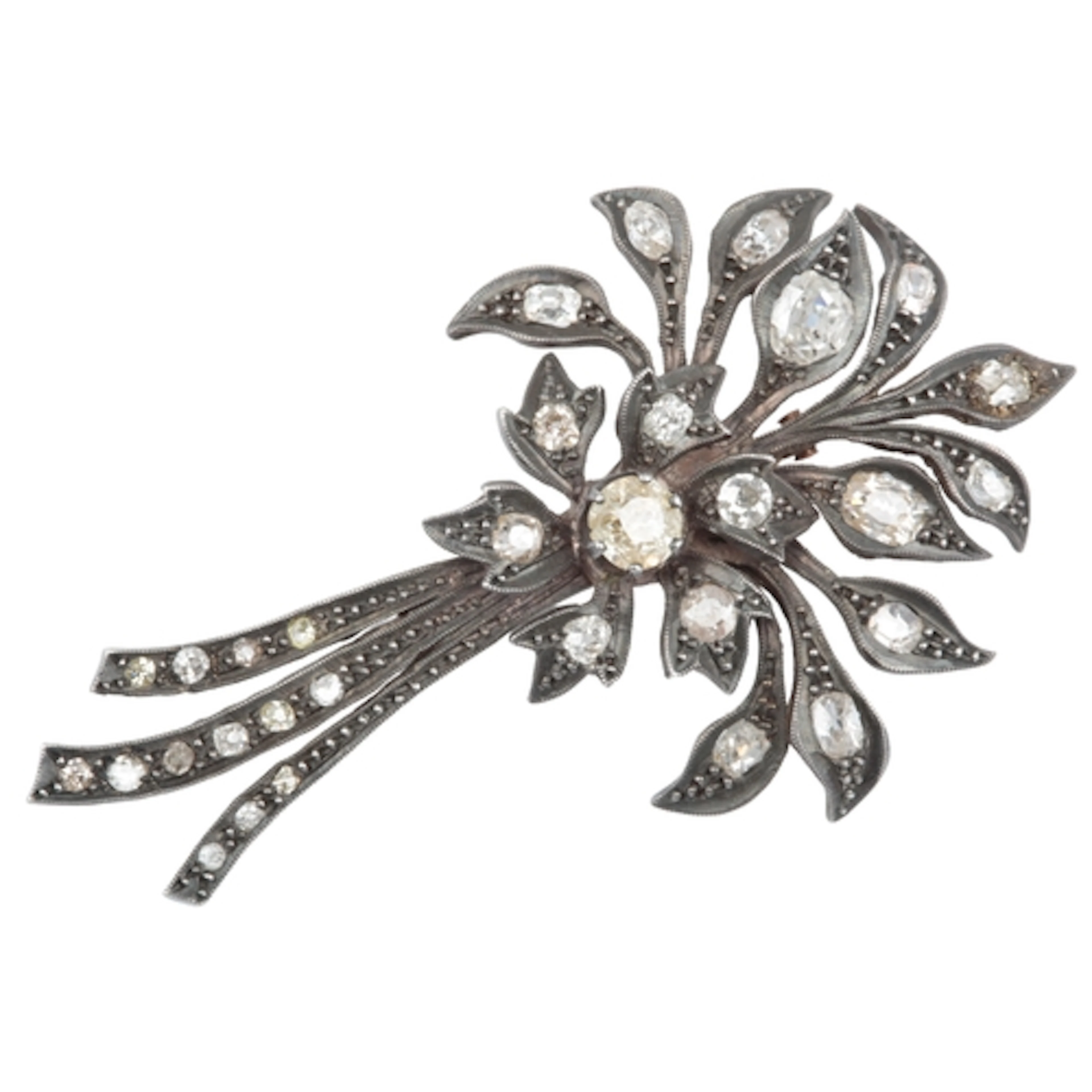 A diamond brooch, designed as a spray of flowers, set with c...