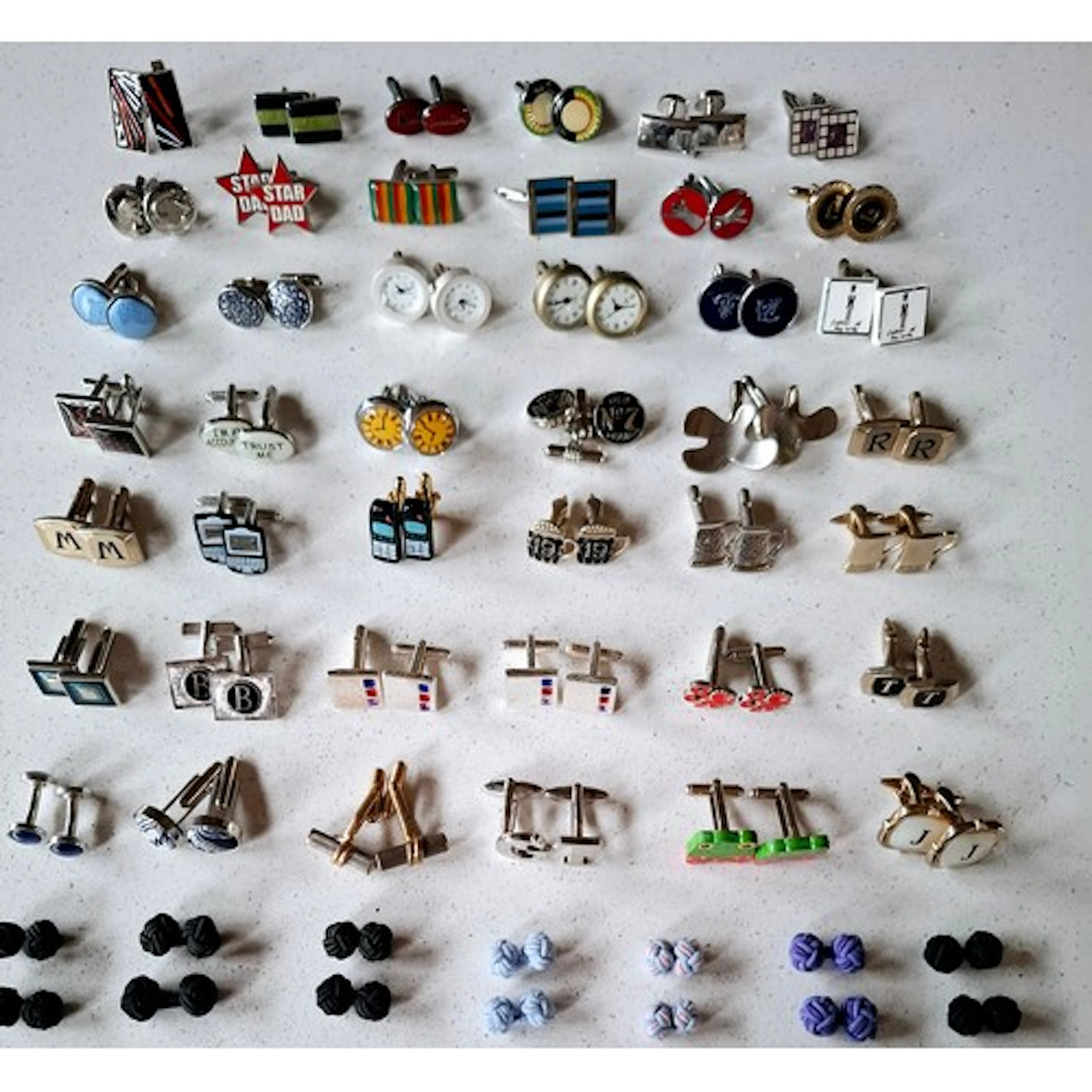 Three pairs of Paul Smith cufflinks, a pair of silver tone D...