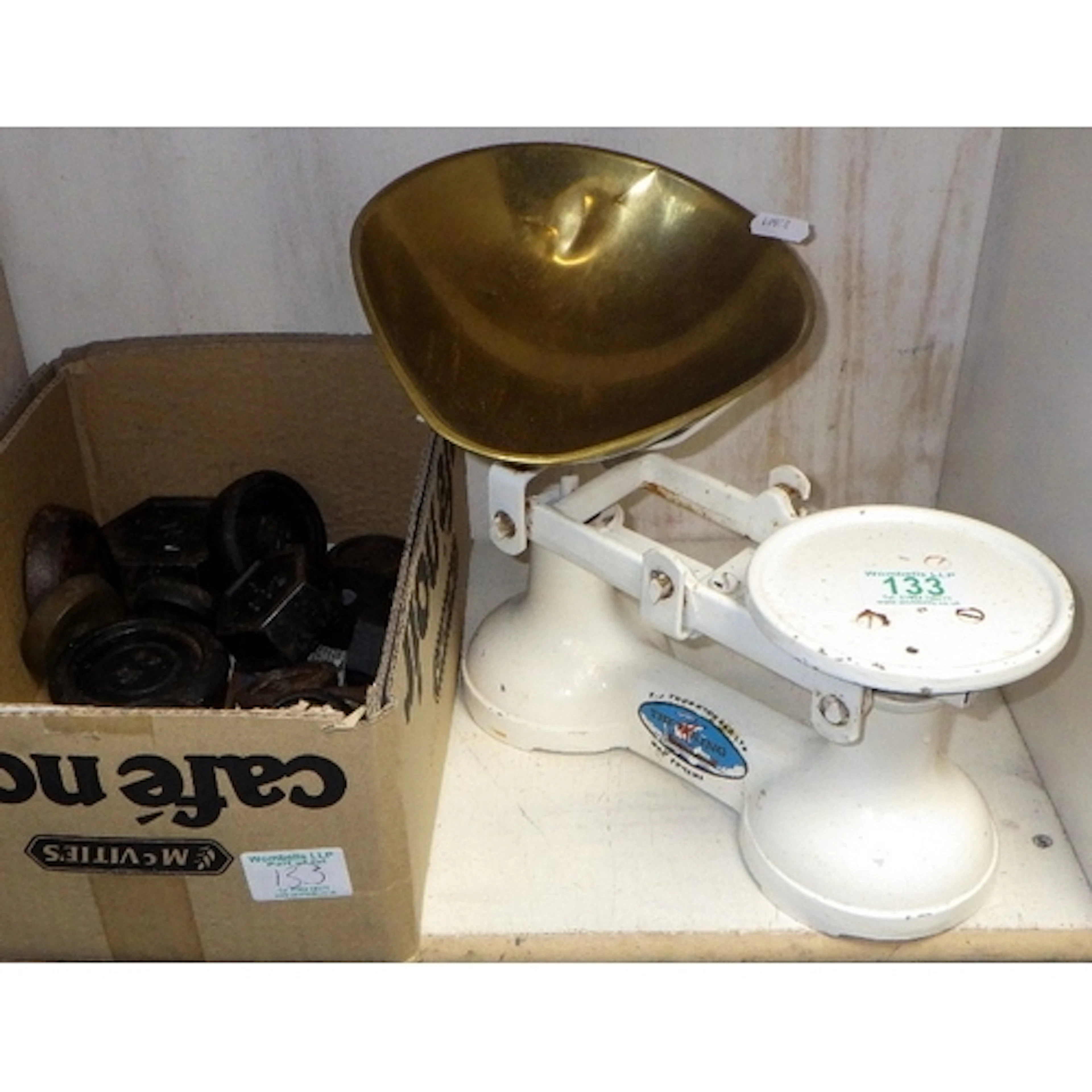 A set of vintage kitchen scales and various weights