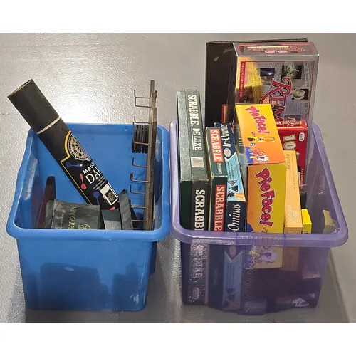 Two boxes of various games to include one of earlier example...