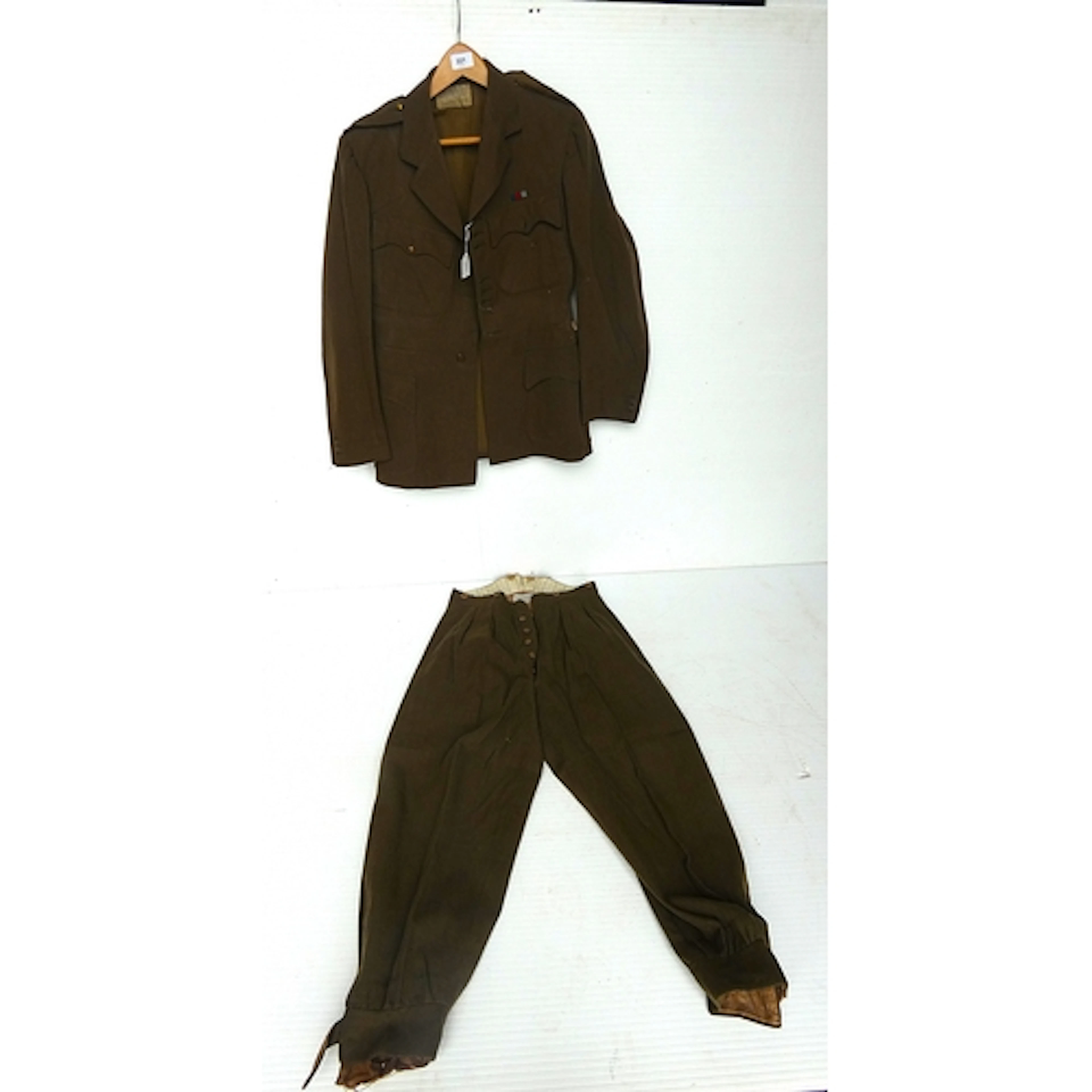 British Army WWII khaki green jacket with C F Johns & Pe...