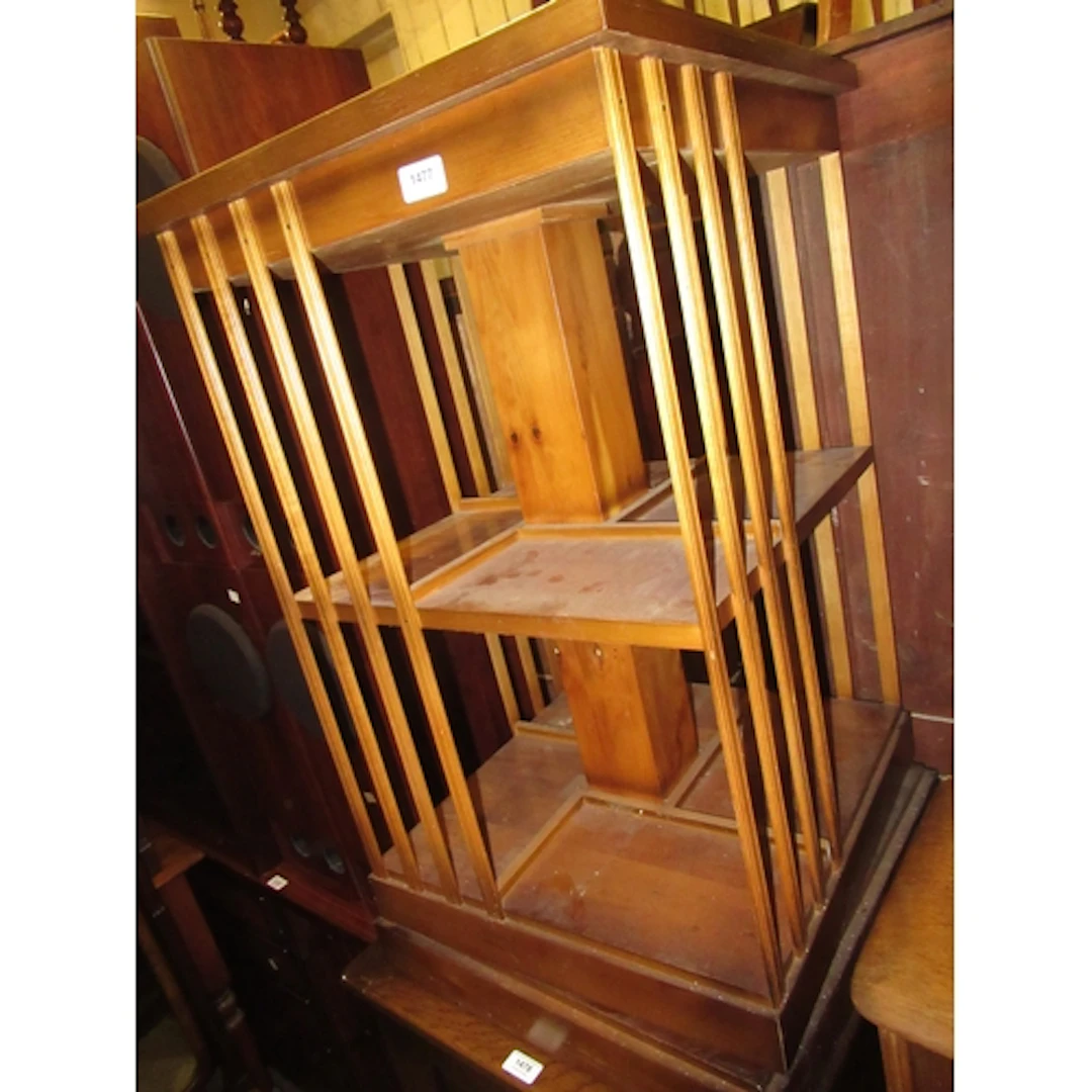 Reproduction yew wood revolving bookcase, 48cm square