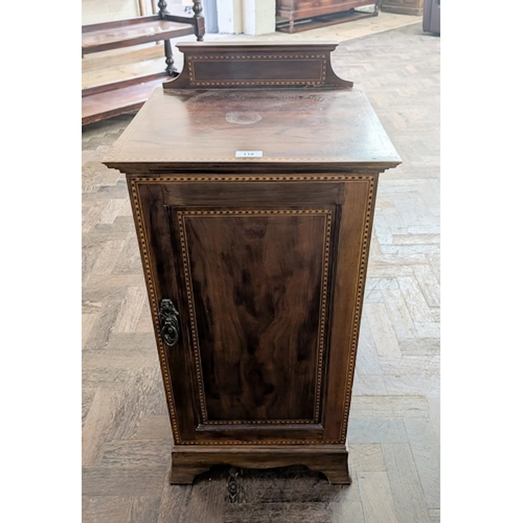An Edwardian inlaid mahogany bedside cabinet