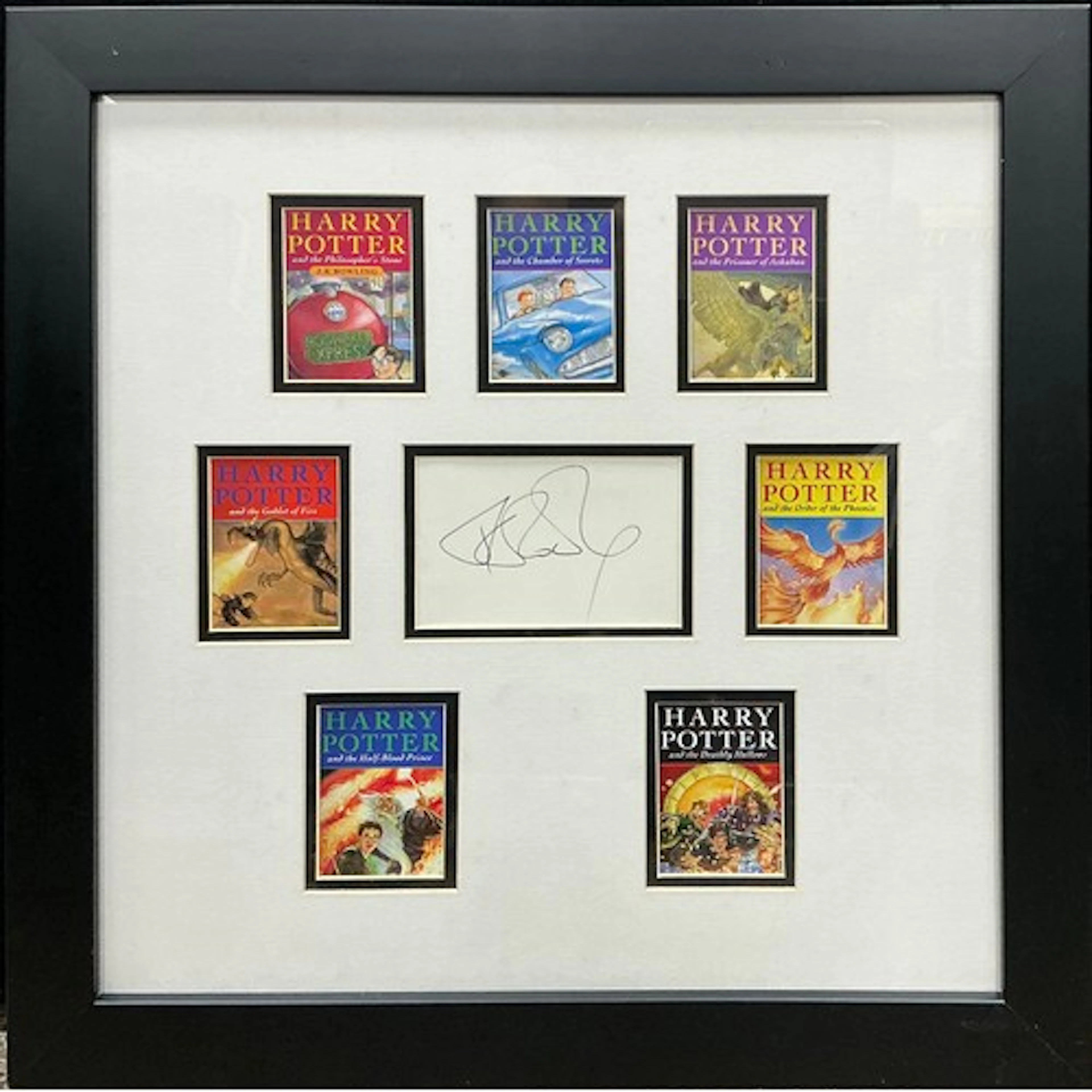 Autographs - J. K. Rowling - A pen signature on paper, frame...