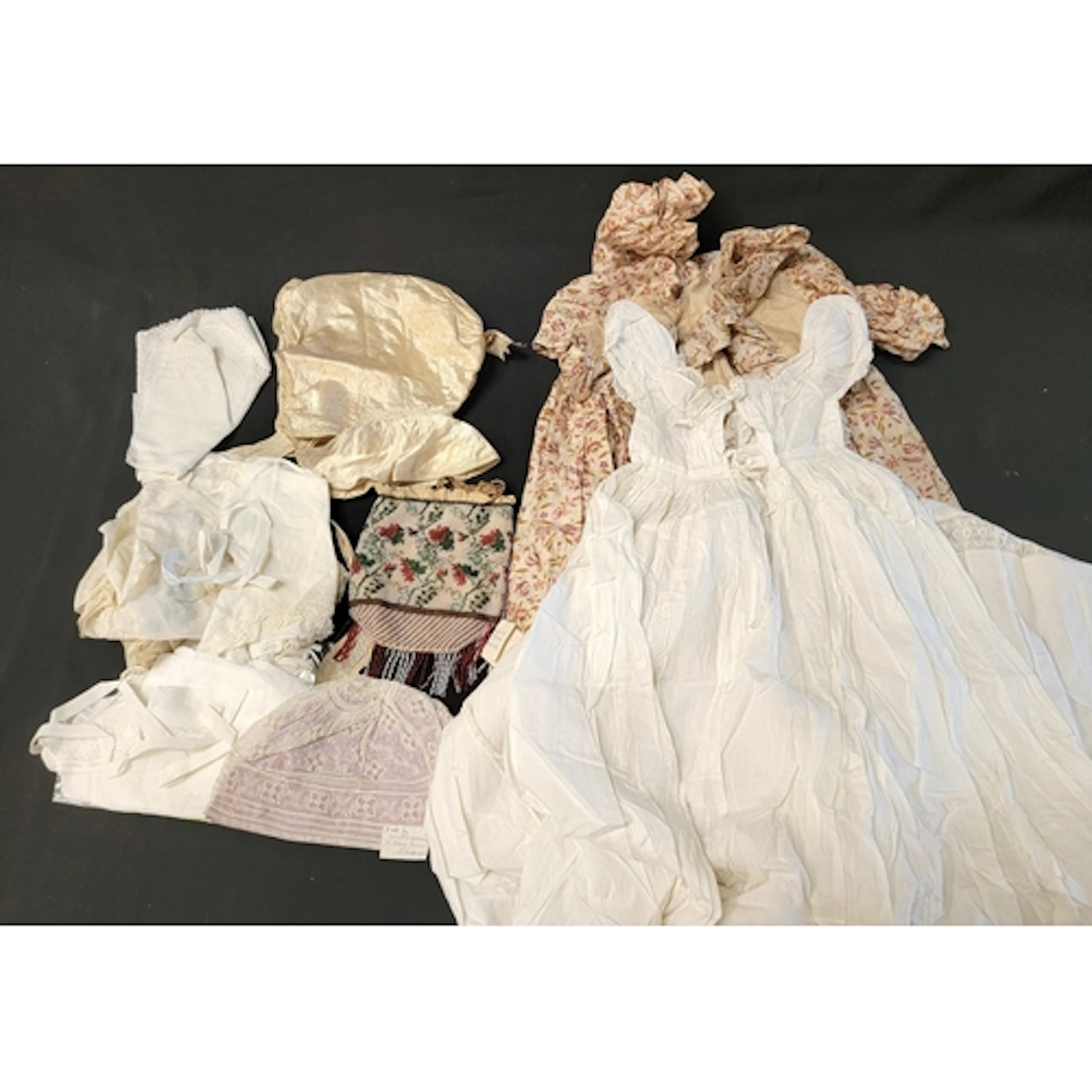 SELECTION OF VICTORIAN CLOTHES including bonnets, a girl's d...
