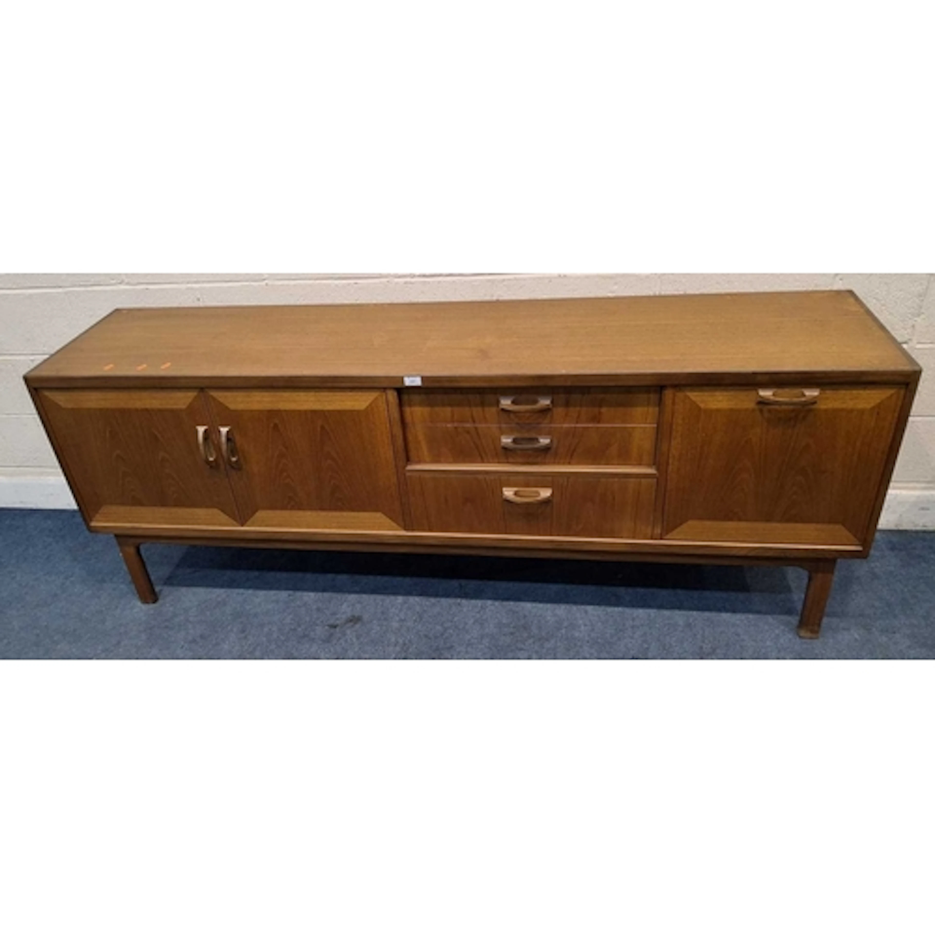 G PLAN SIERRA, A MID-CENTURY TEAK SIDEBOARD, fitted with dou...