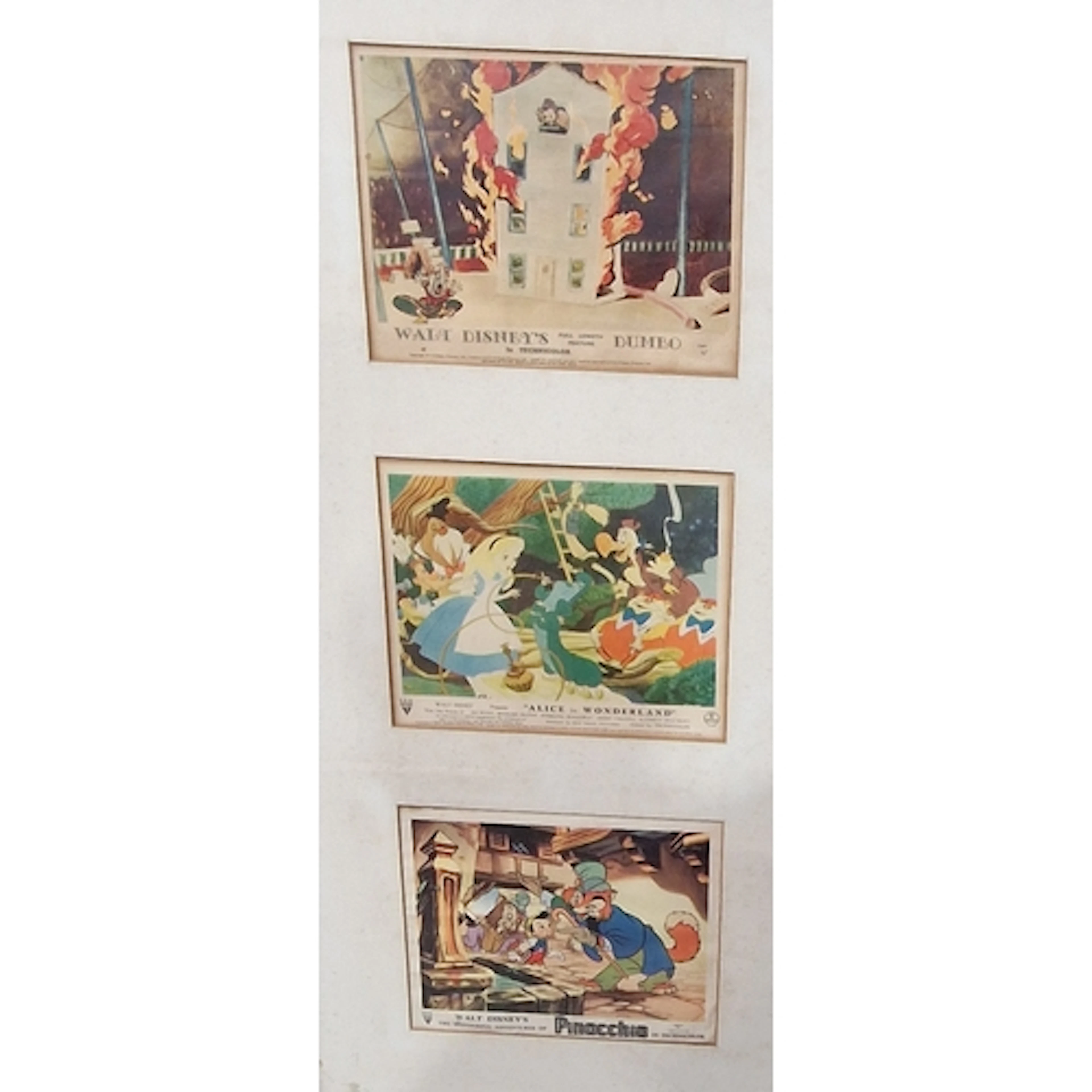 Three colour prints depicting Walt Disney's Dumbo, Alice in ...