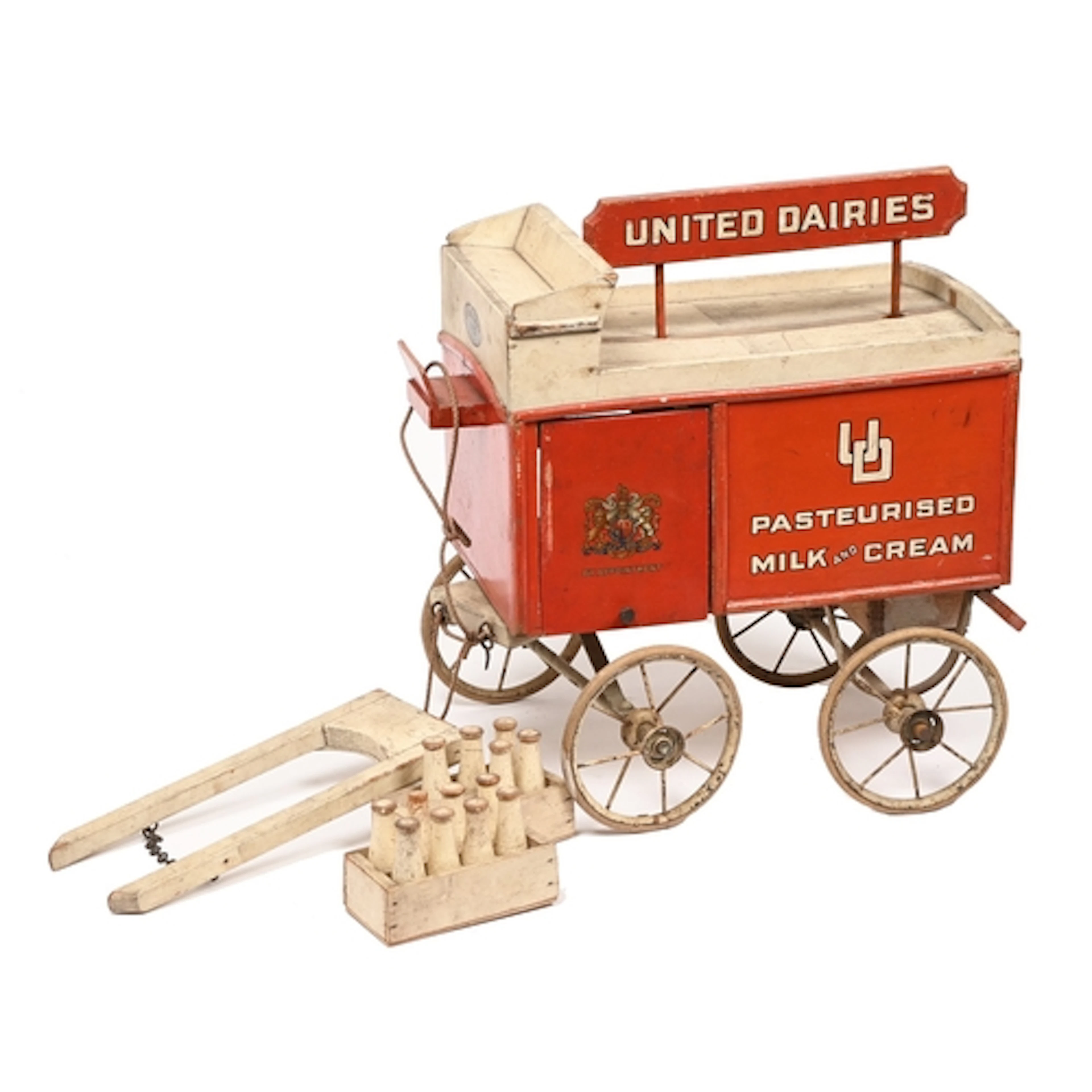 A Swallow Toys red-green painted wood horse drawn United Dai...