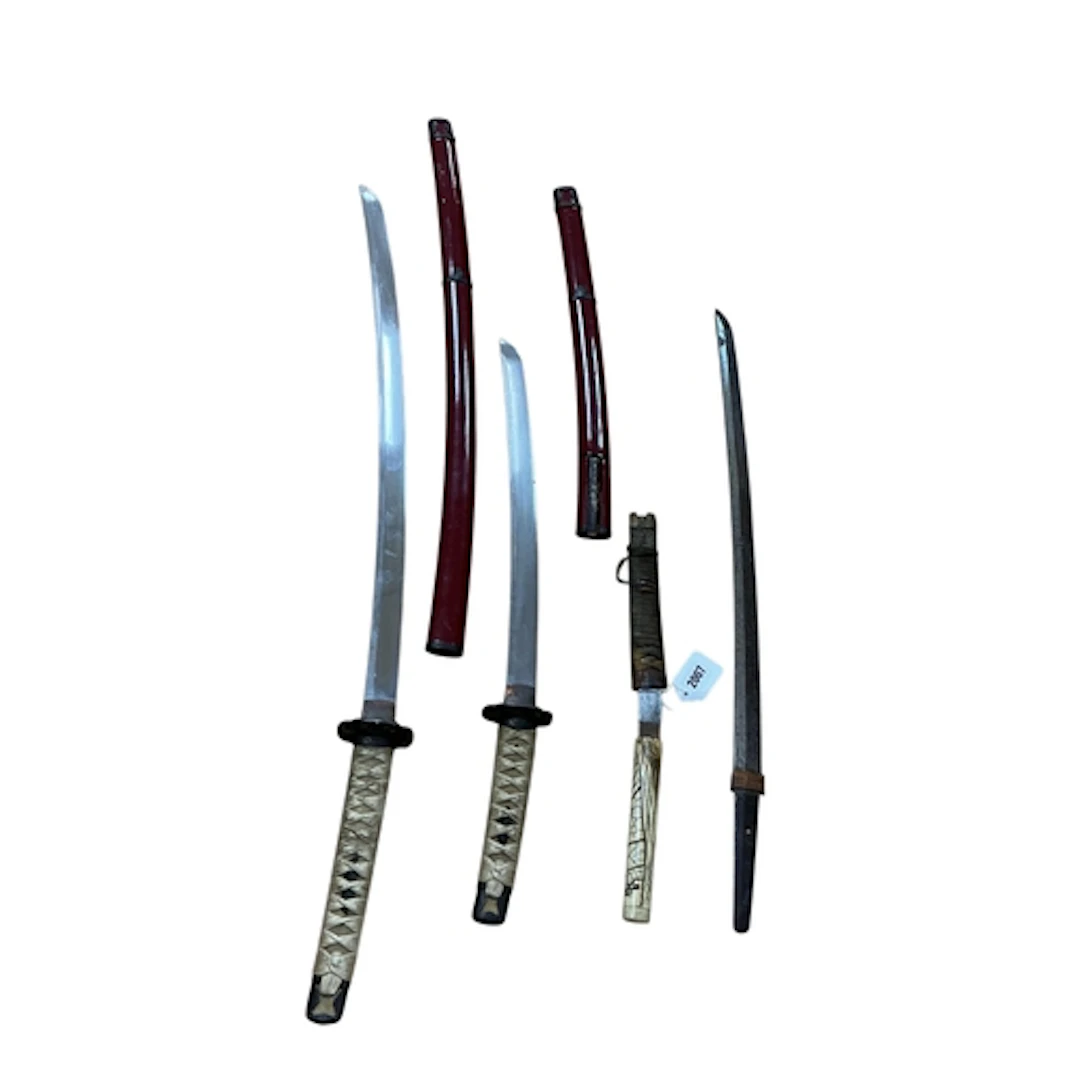 A pair of Japanese swords daisho, c.1950, blades 68.3cm and ...