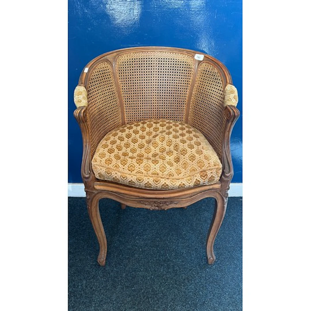 Vintage caned back bergere armchair chair.