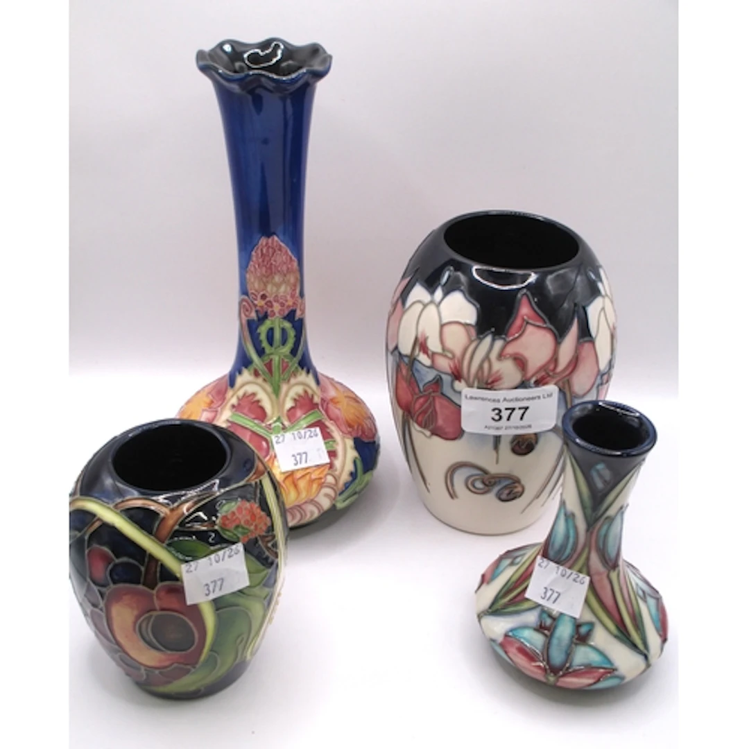 Three various small Moorcroft vases, the tallest 13cm, toget...