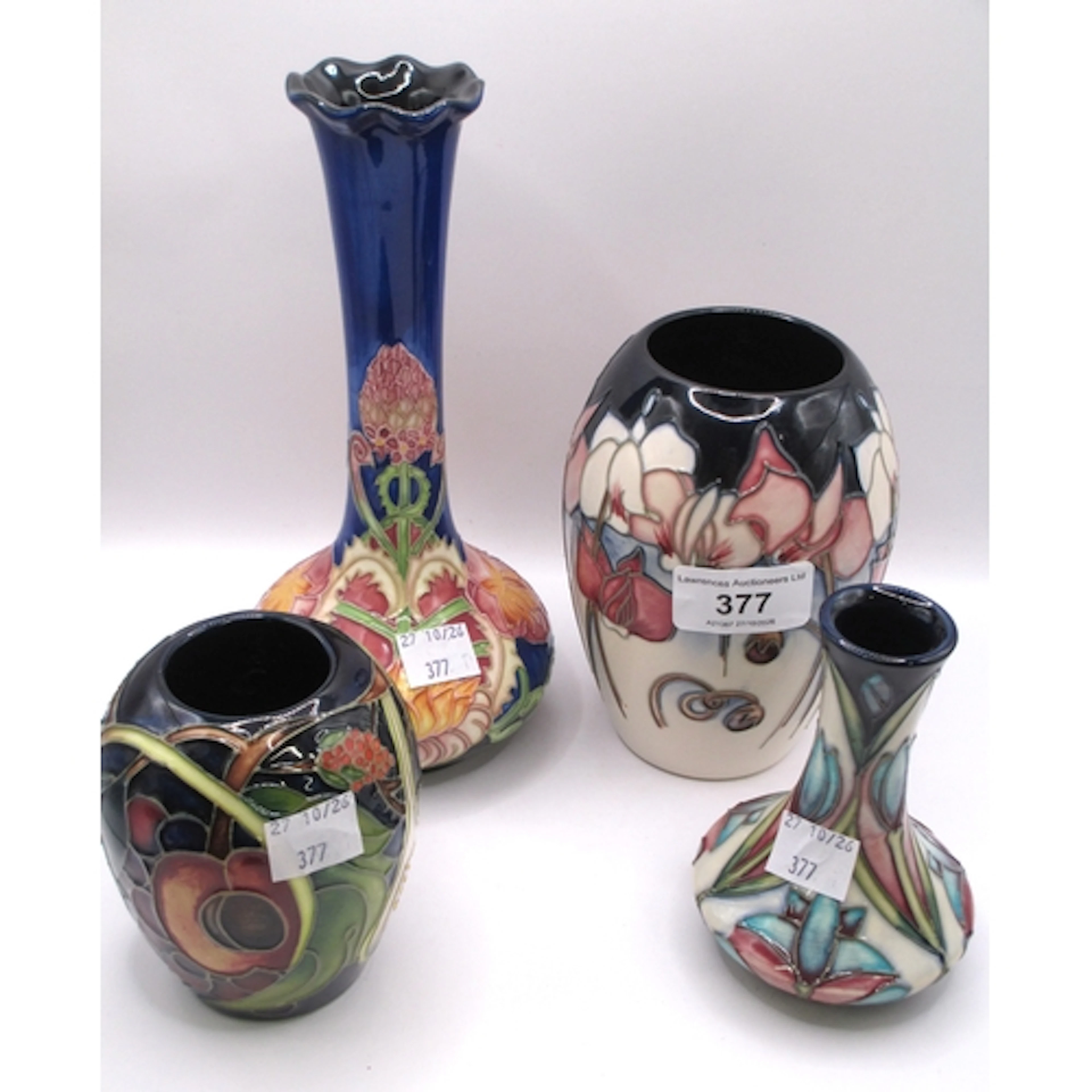 Three various small Moorcroft vases, the tallest 13cm, toget...