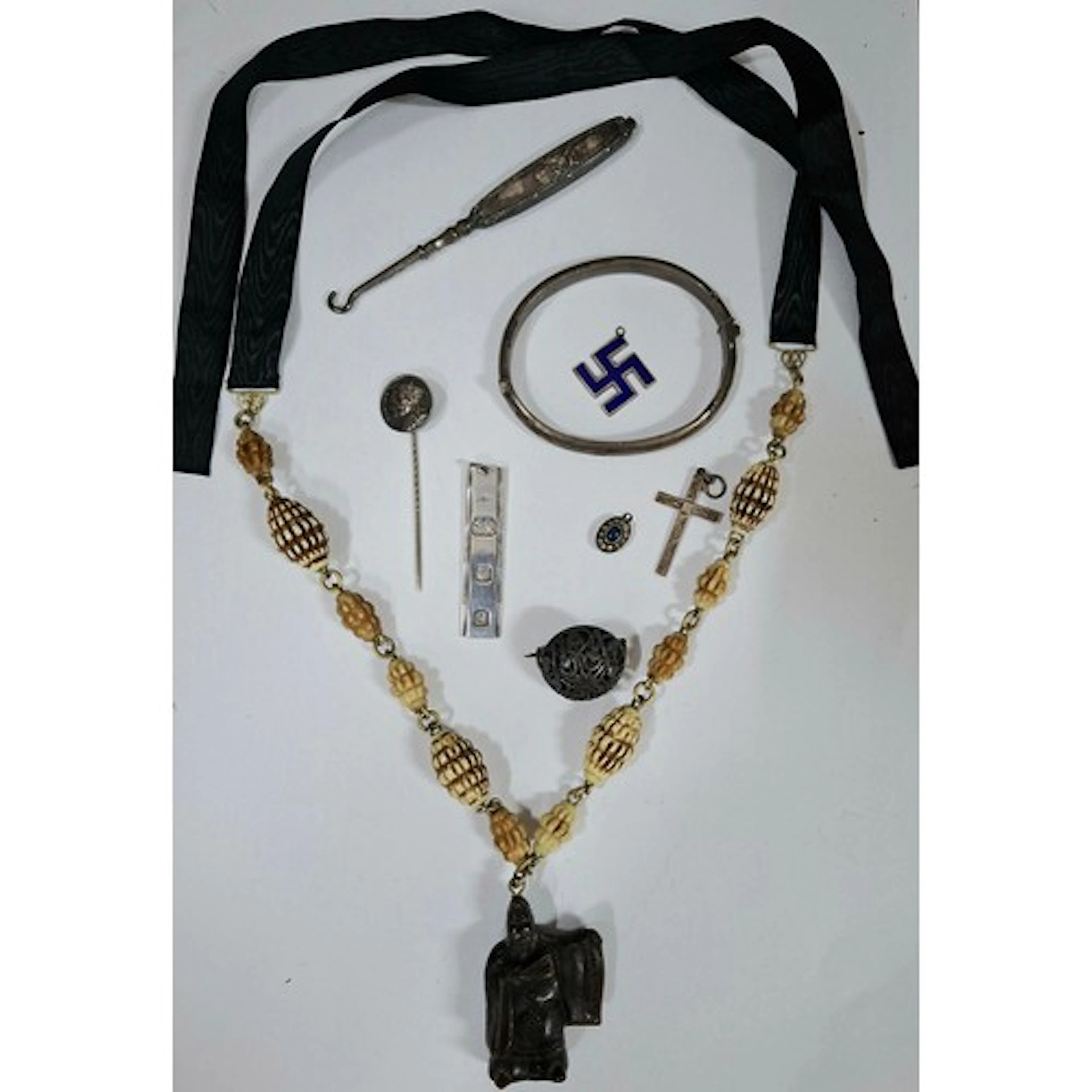 A quantity of vintage silver and white metal costume jewelle...