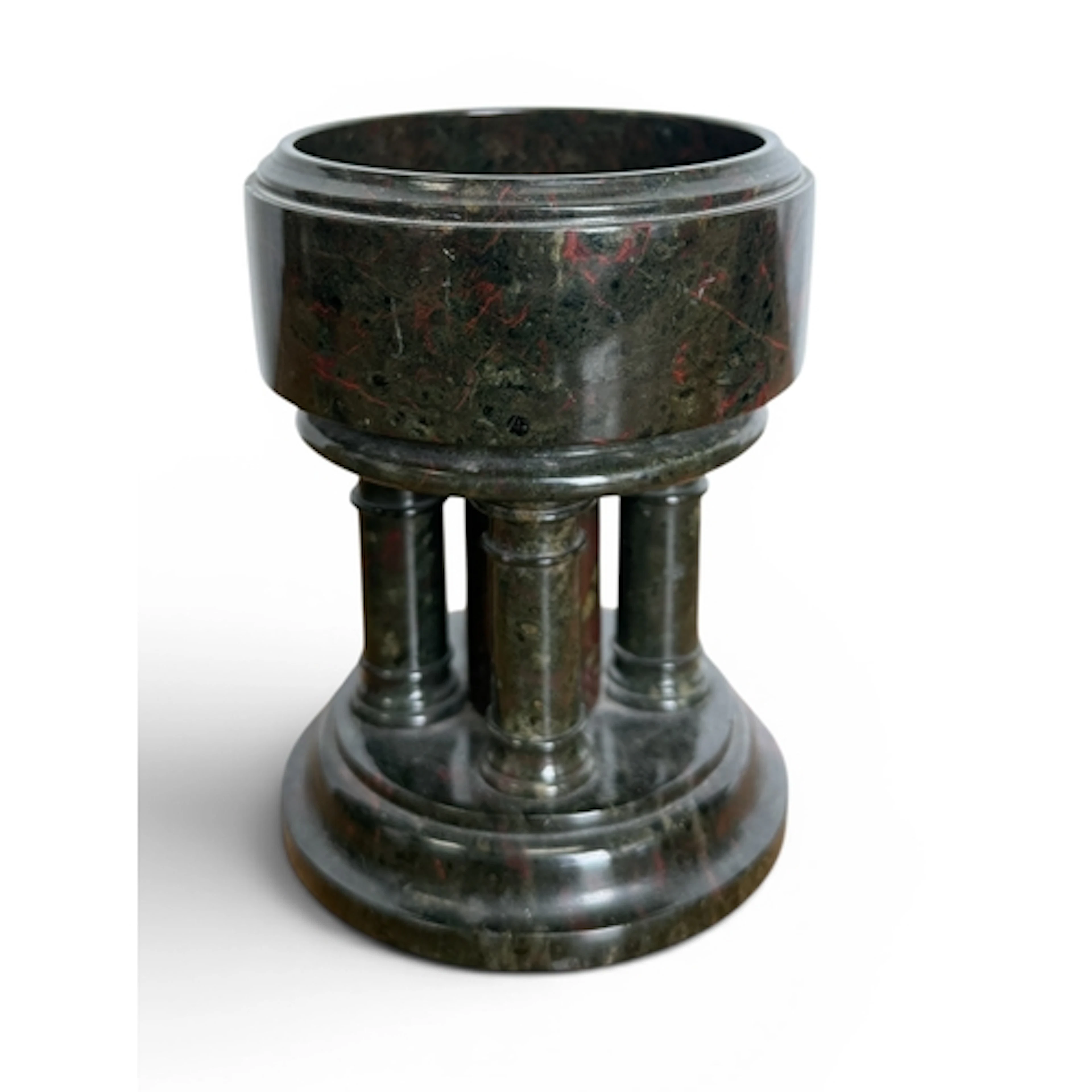 A GREEN MARBLE FONT TOGETHER WITH A LARGE BLACK GLAZED CERAM...