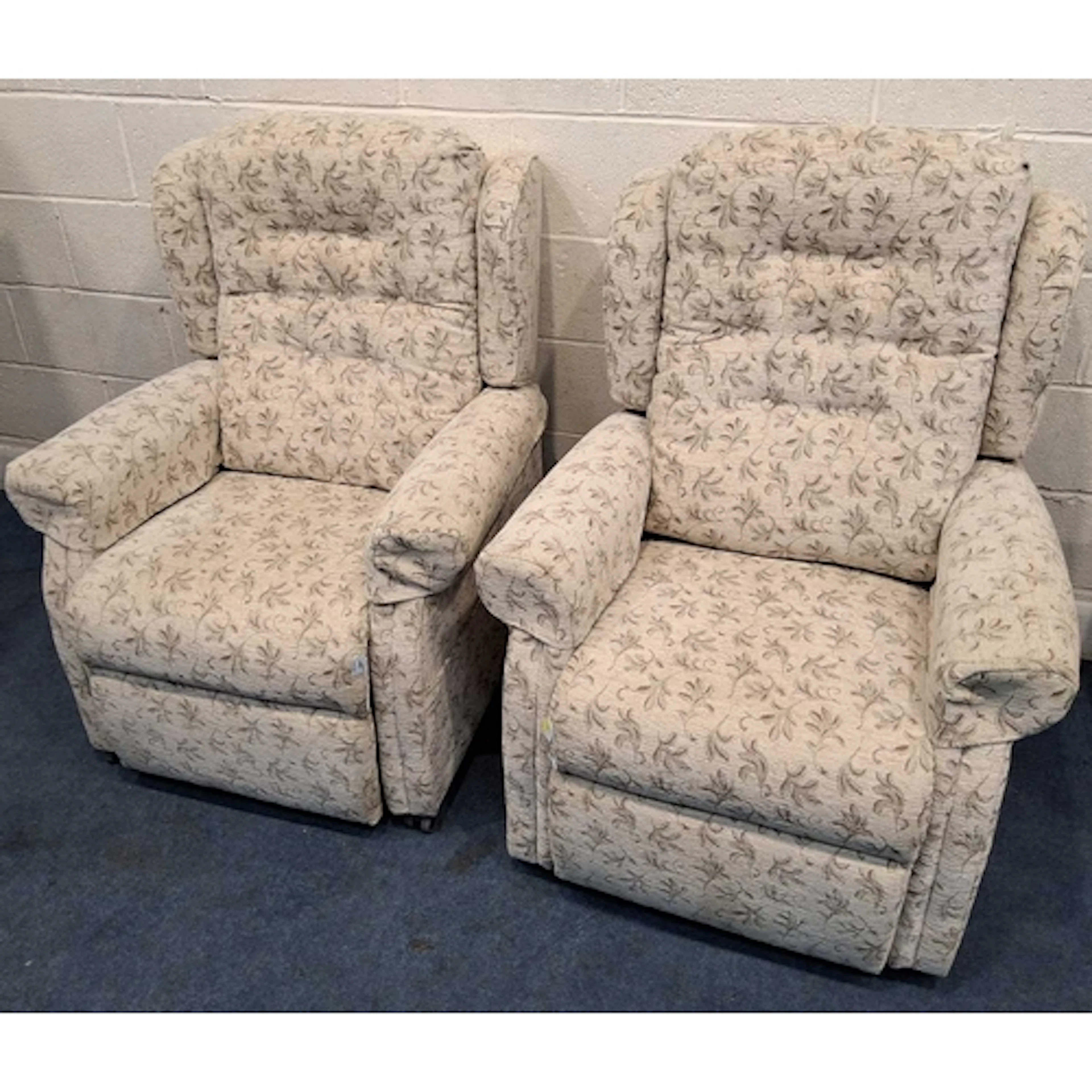 A PAIR OF BEIGE AN FOLIATE UPHOLSTERED ELECTRIC RISE AND REC...