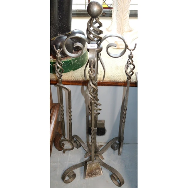 Large patinated wrought iron companion set, 105cm high