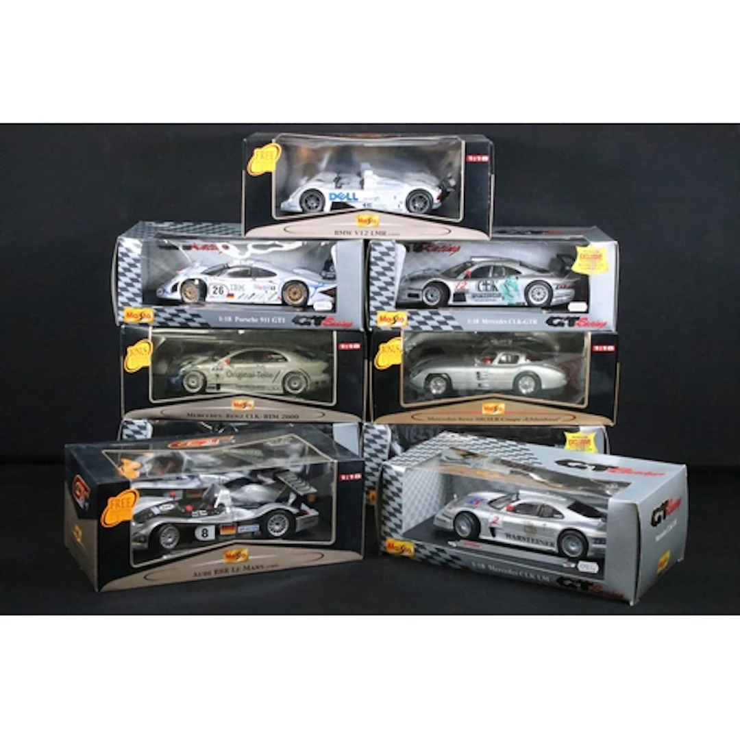 Nine boxed 1/18 Maisto GT Racing and Premiere Edition diecas...
