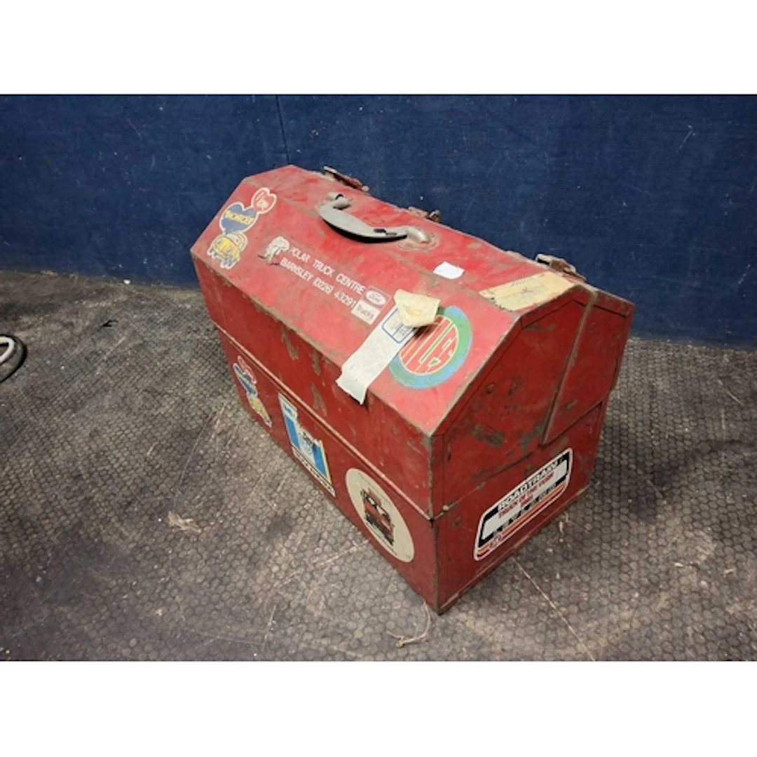 A VINTAGE METAL CANTILEVER TOOLBOX containing tools some di...