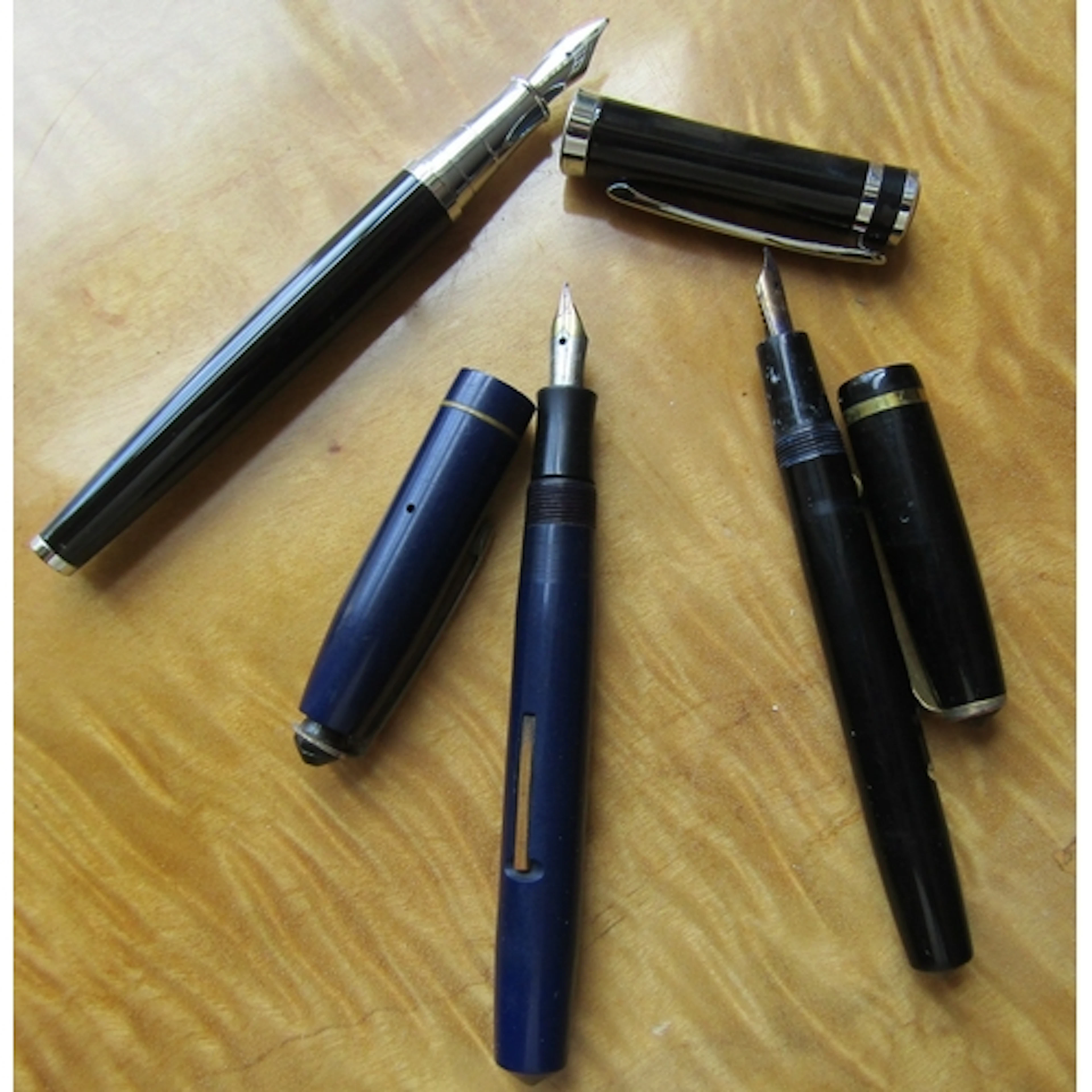 Three Vintage Fountain Pens Including One with Fourteen Cara...