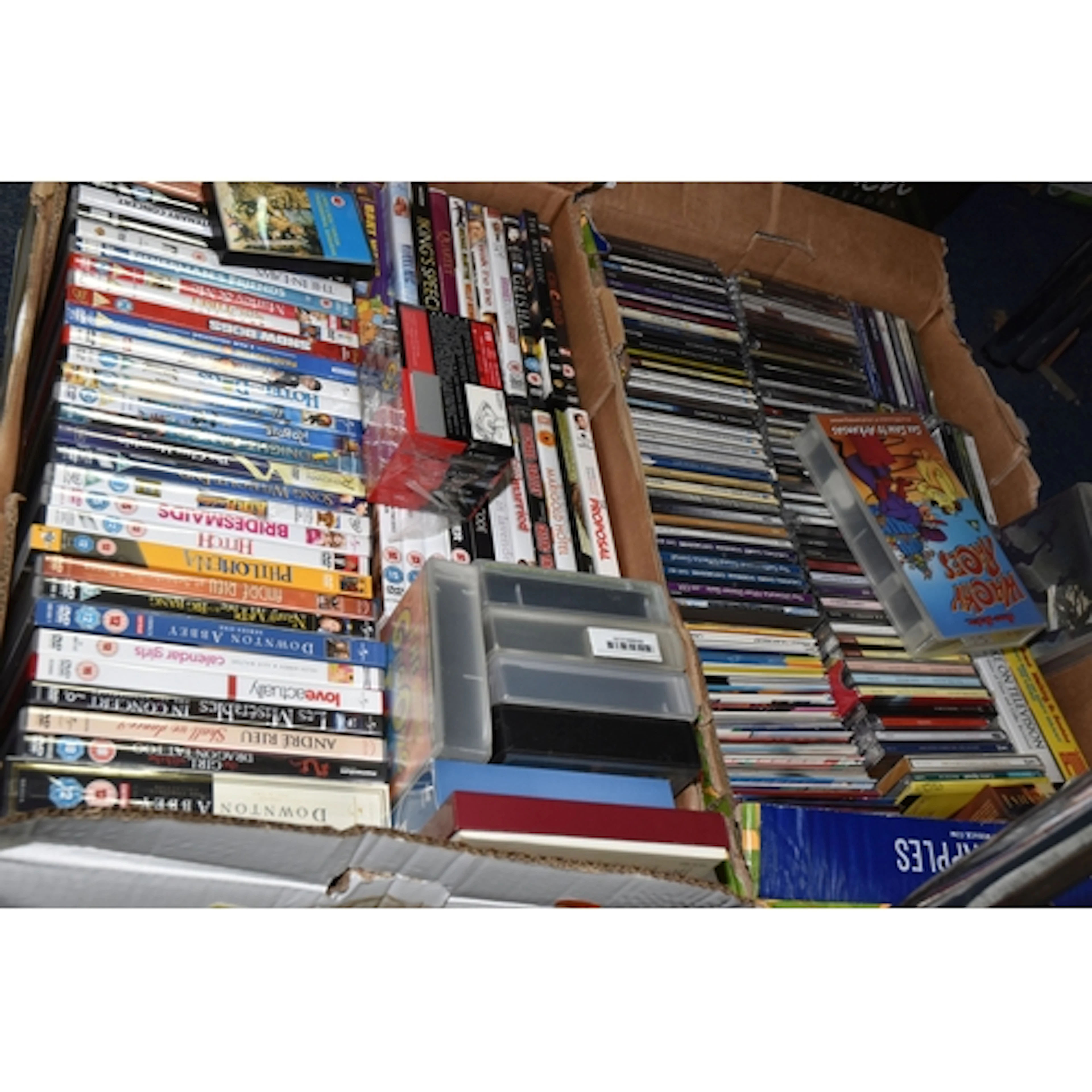 TWO BOXES OF DVDS AND CDS to include 1 box containing approx...