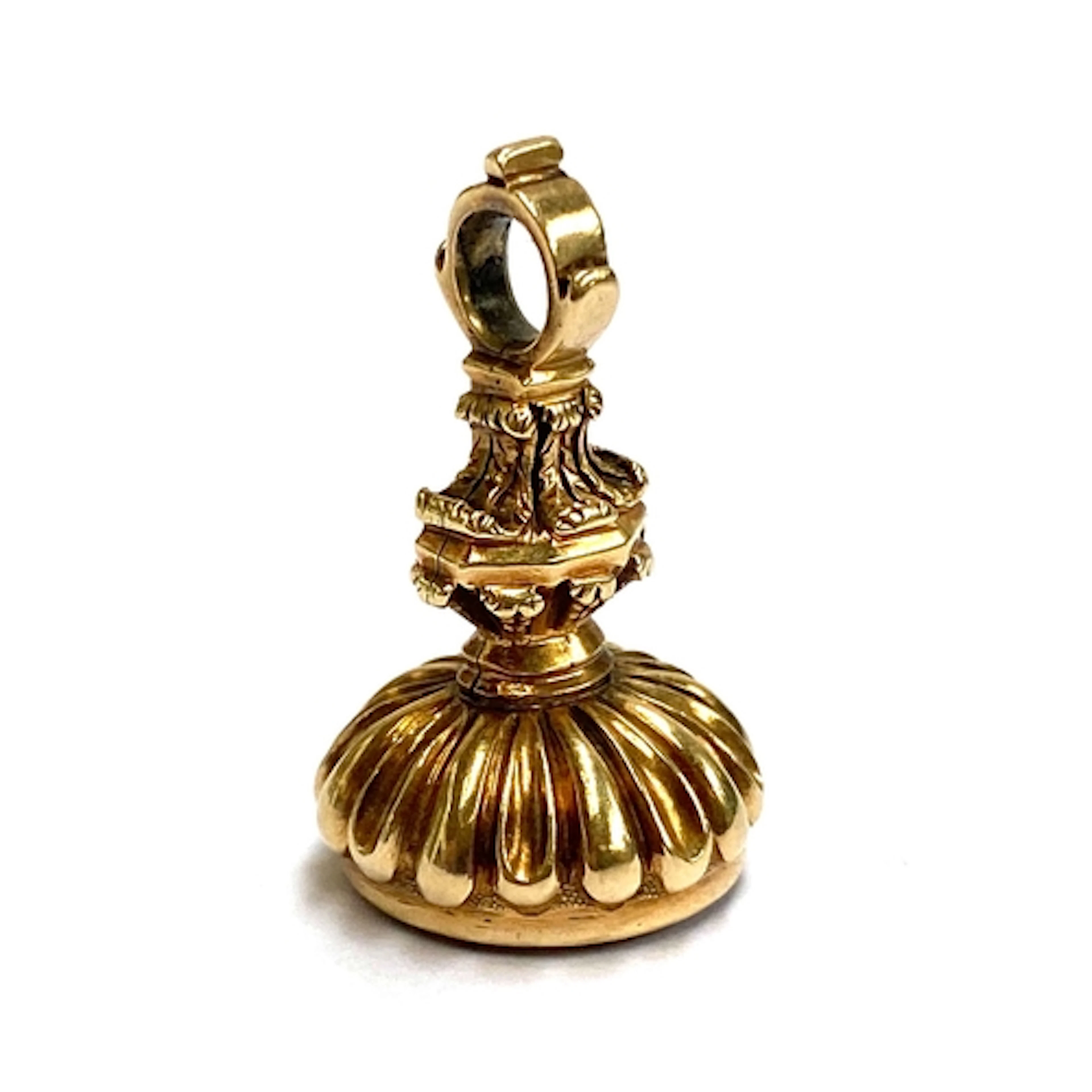 A smart 19th century gold fob seal, the citrine intaglio car...