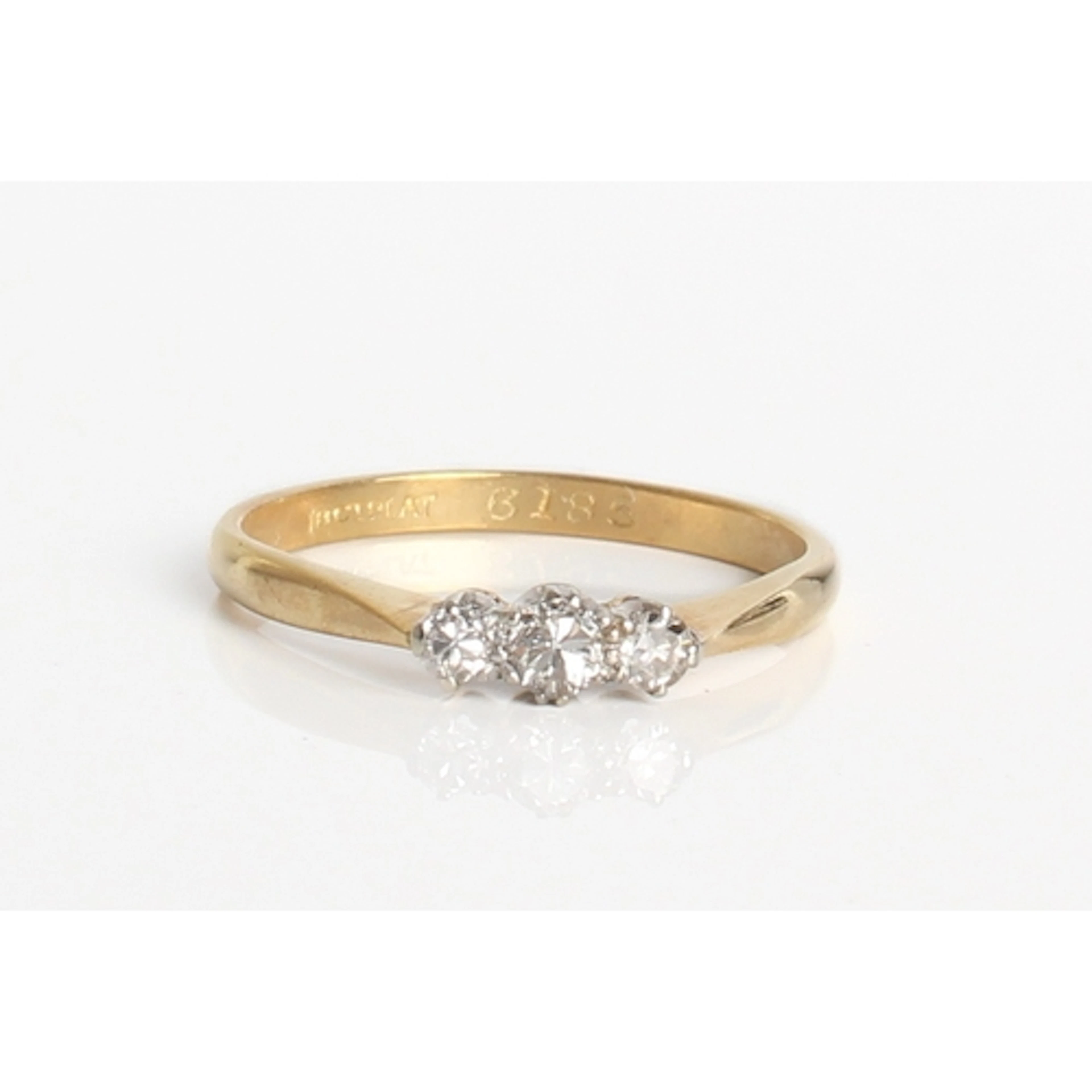 A mid-century 18ct gold, platinum and diamond trilogy ring -...