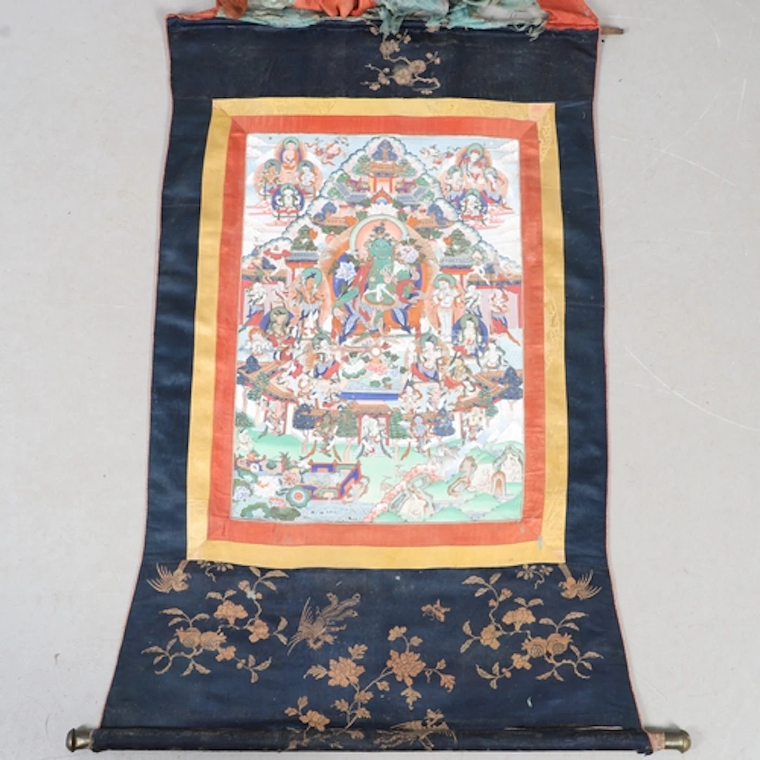 TIBETAN THANKA SCROLL. Probably late 19thc, the panel painte...