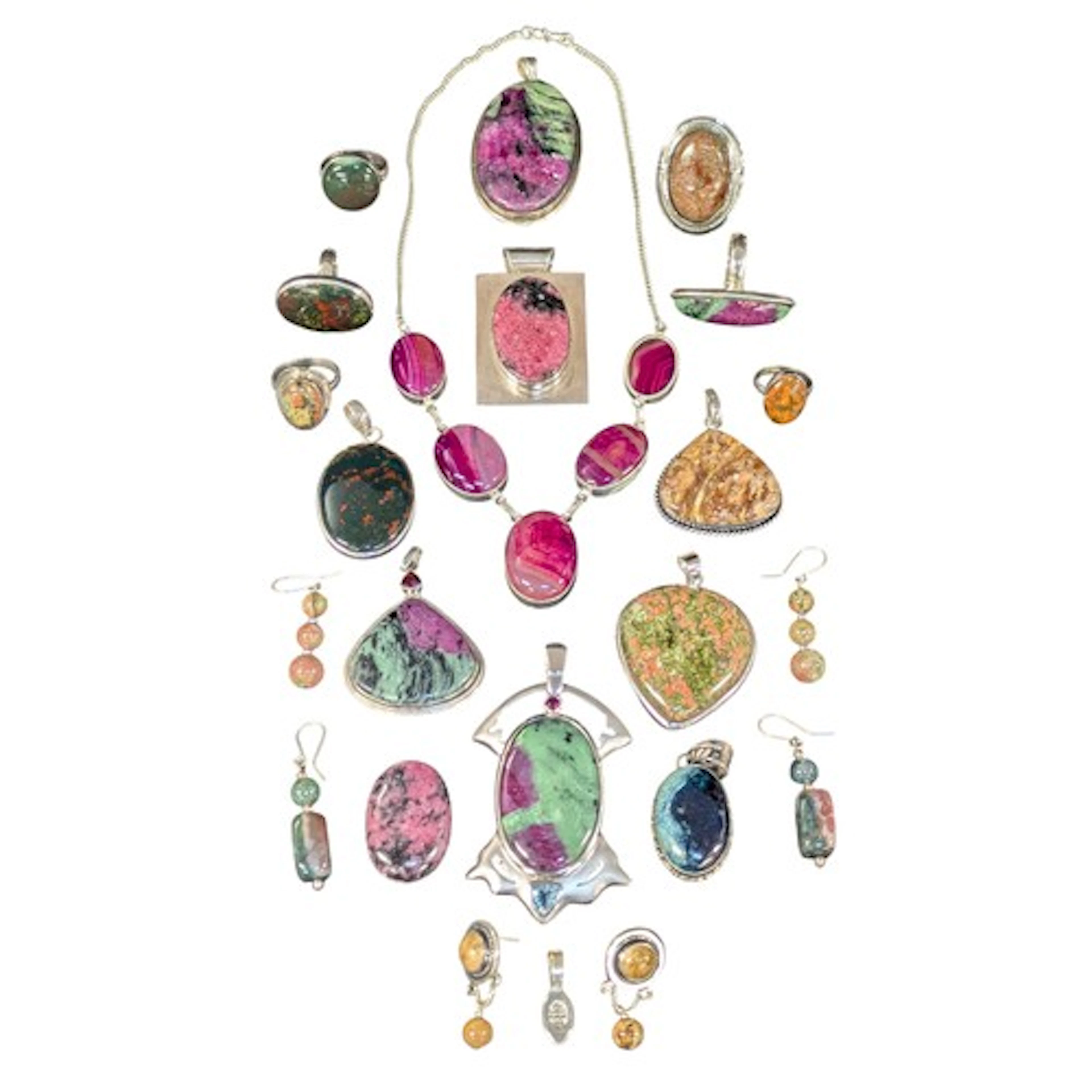 A silver metal mounted zoisite oval cabochon pendant others,...