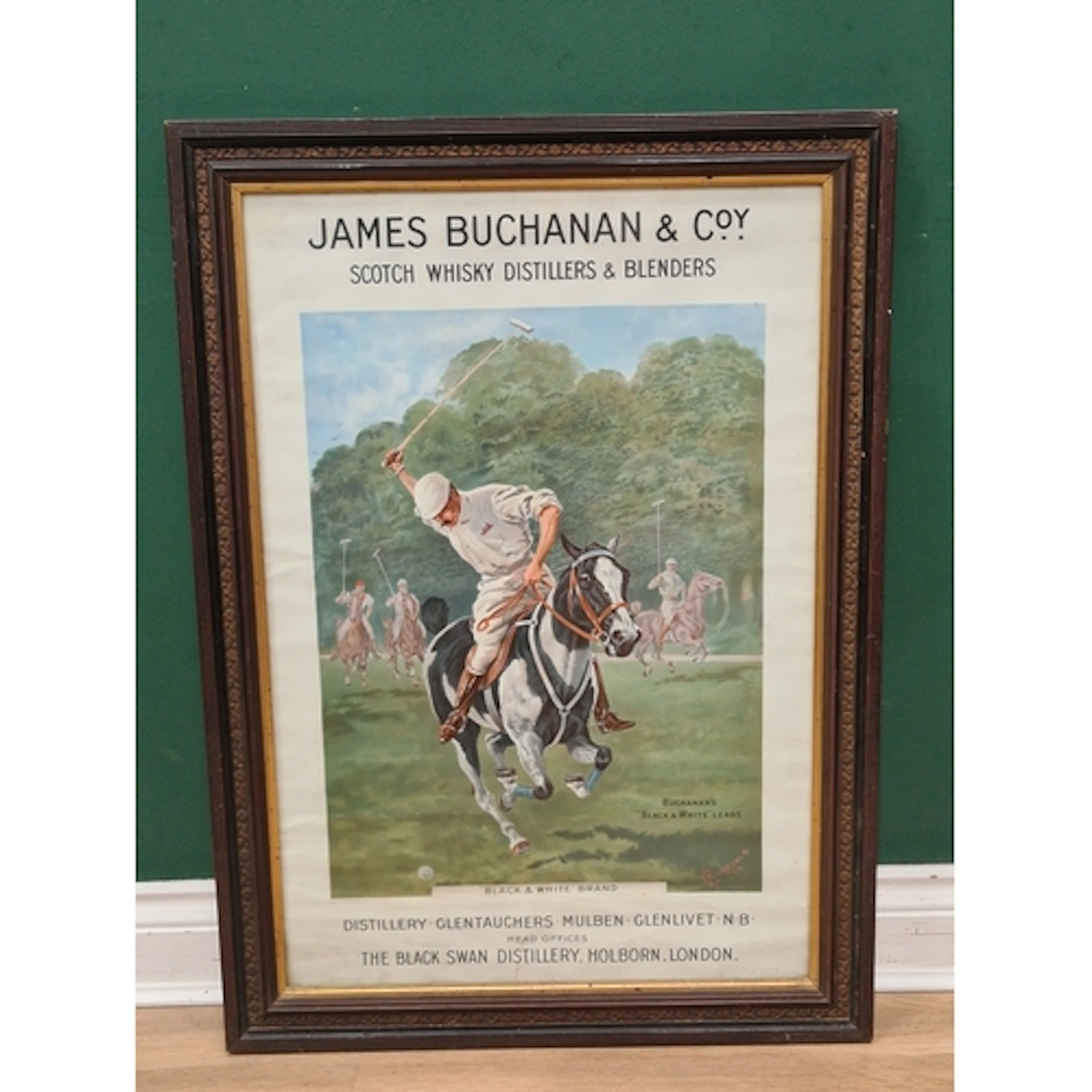 A framed James Buchanan and Company Scotch Whisky Distillers...