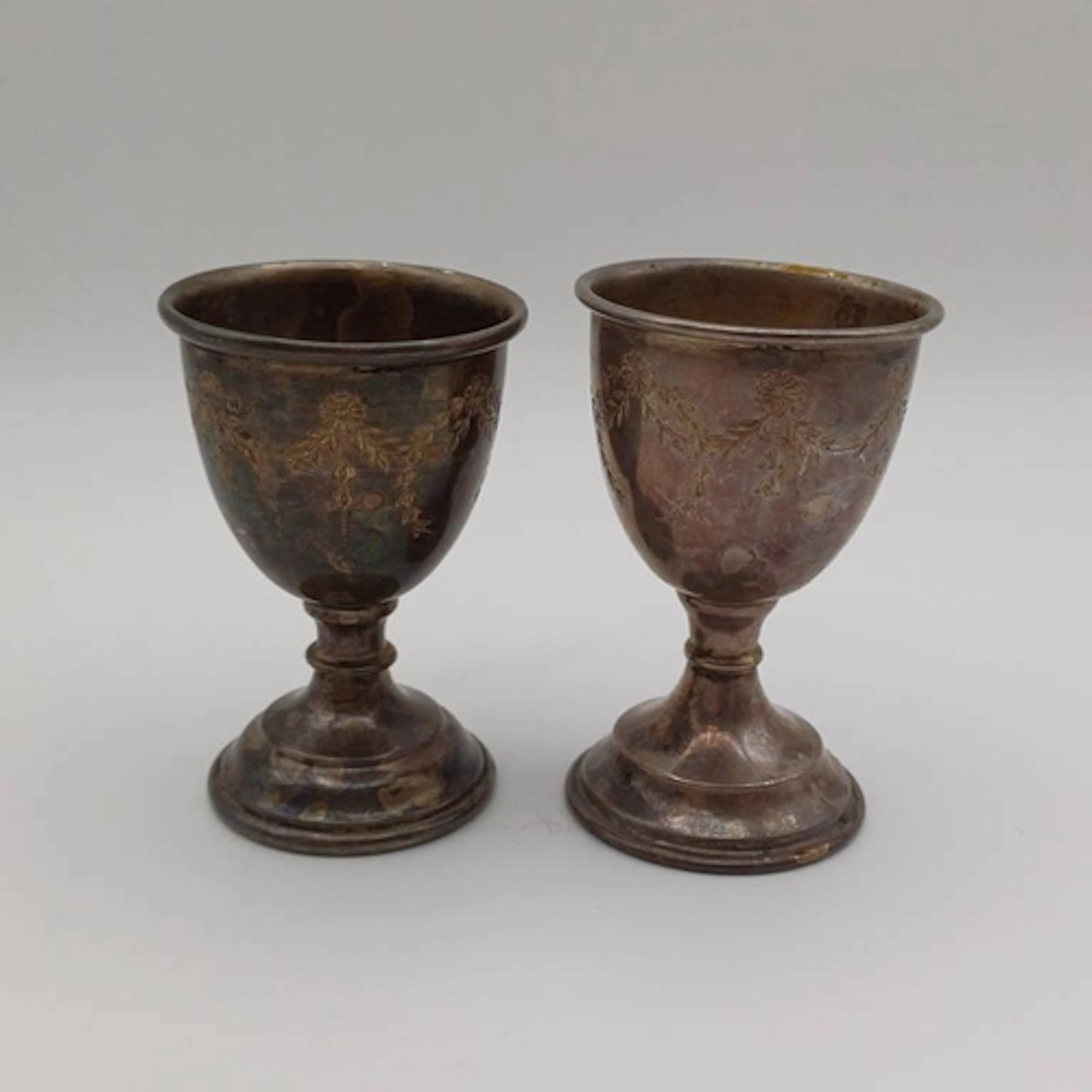 2 SILVER EGG CUPS WITH ETCHED FLORAL & LEAF DECORATION BY ER...