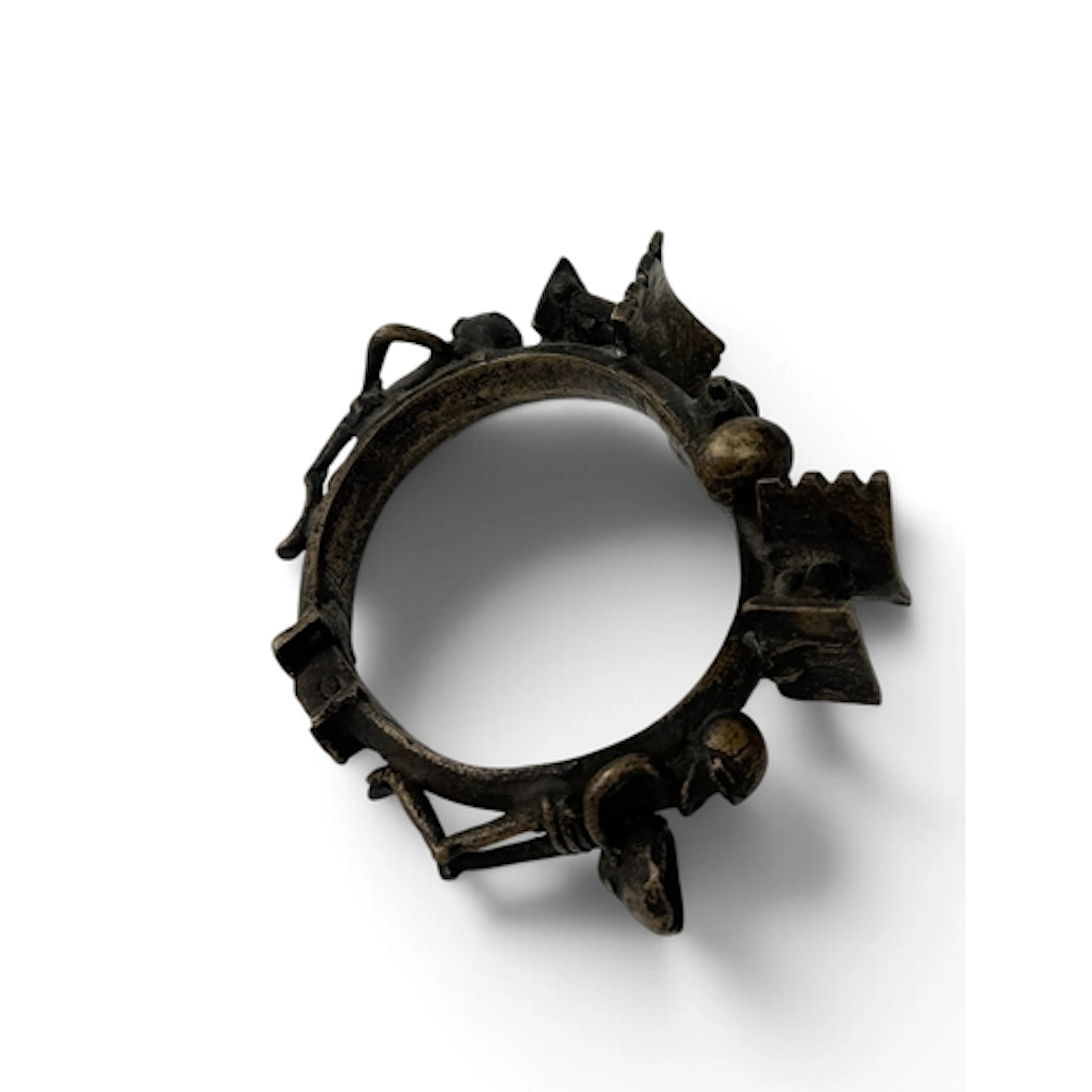 A TRIBAL AFRICAN BRASS BRACELET CAST WITH HUMAN FIGURES AND ...