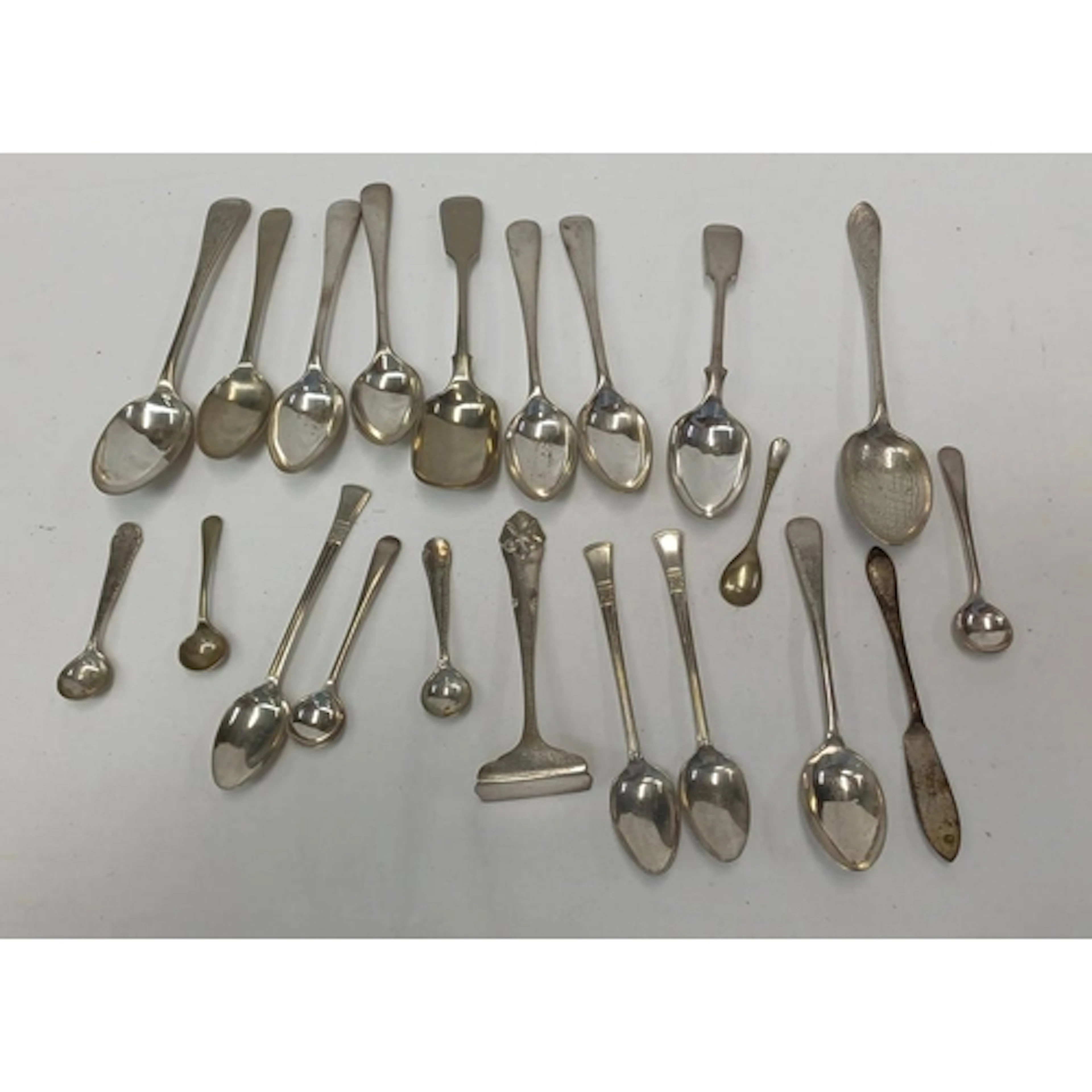 A SCOTTISH SILVER TEASPOON WITH ENGRAVED DECORATION BY LAWSO...