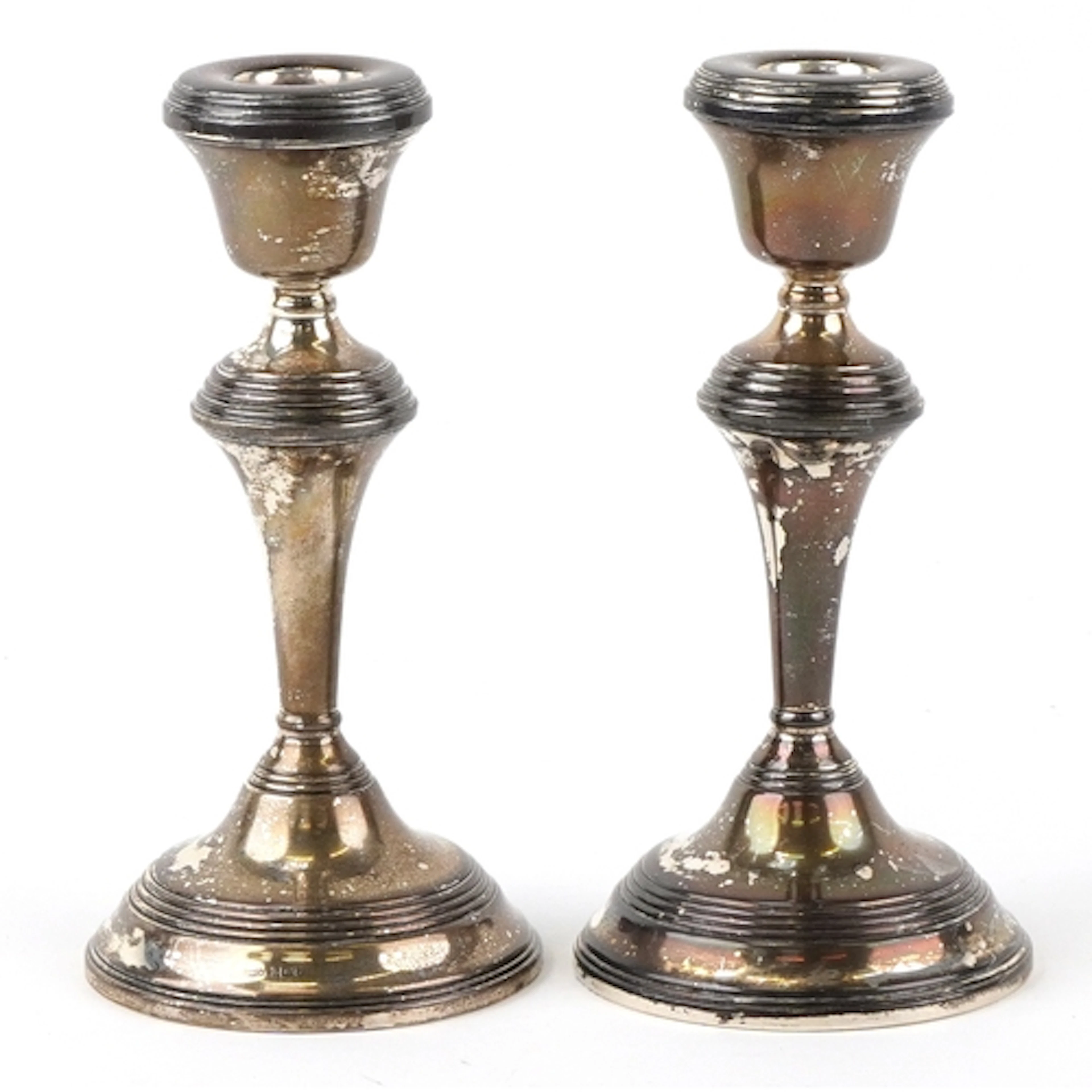 W I Broadway & Co., pair of Elizabeth II silver candlesticks...