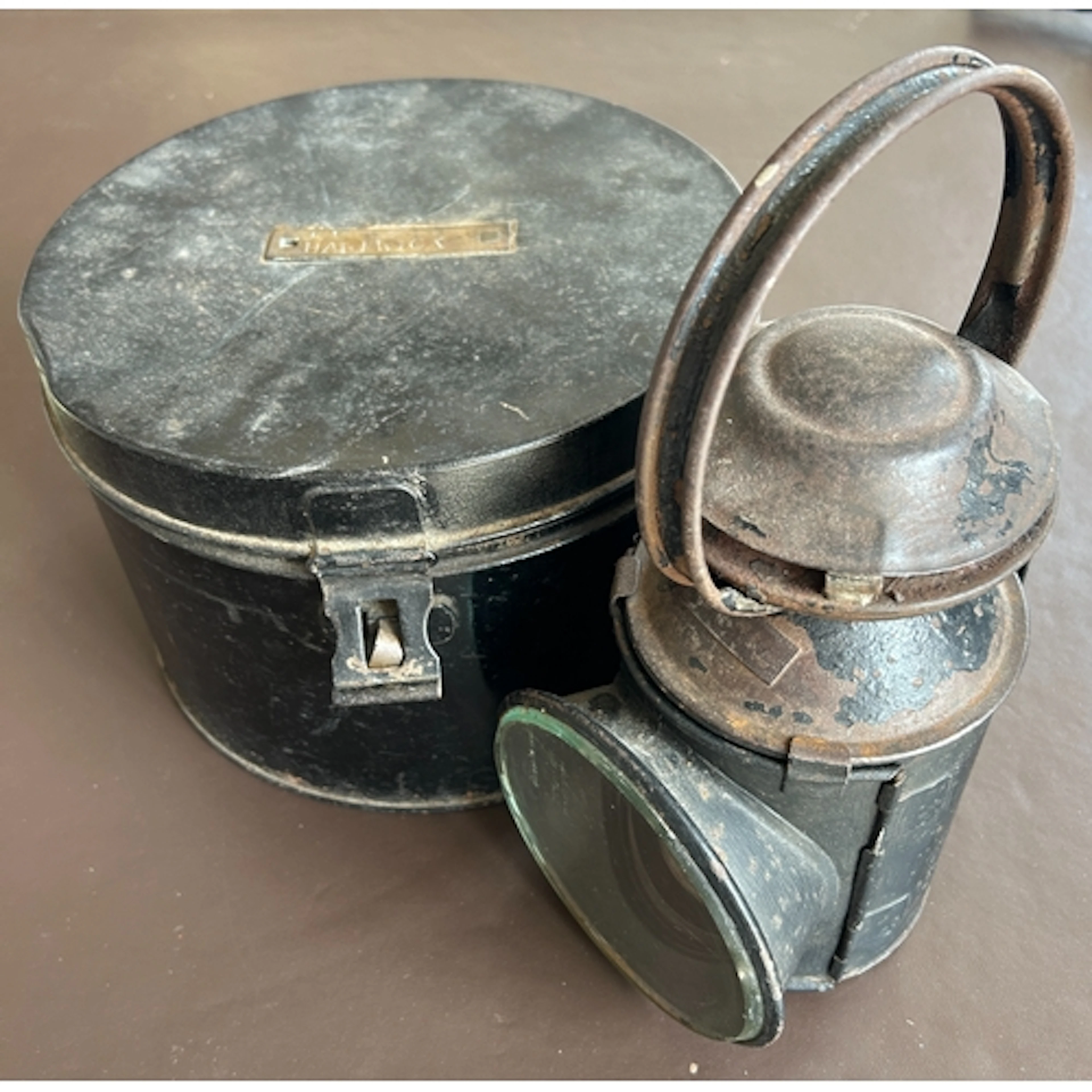 An L.N.E.R. Loco oil lamp, with small rectangular name plate...