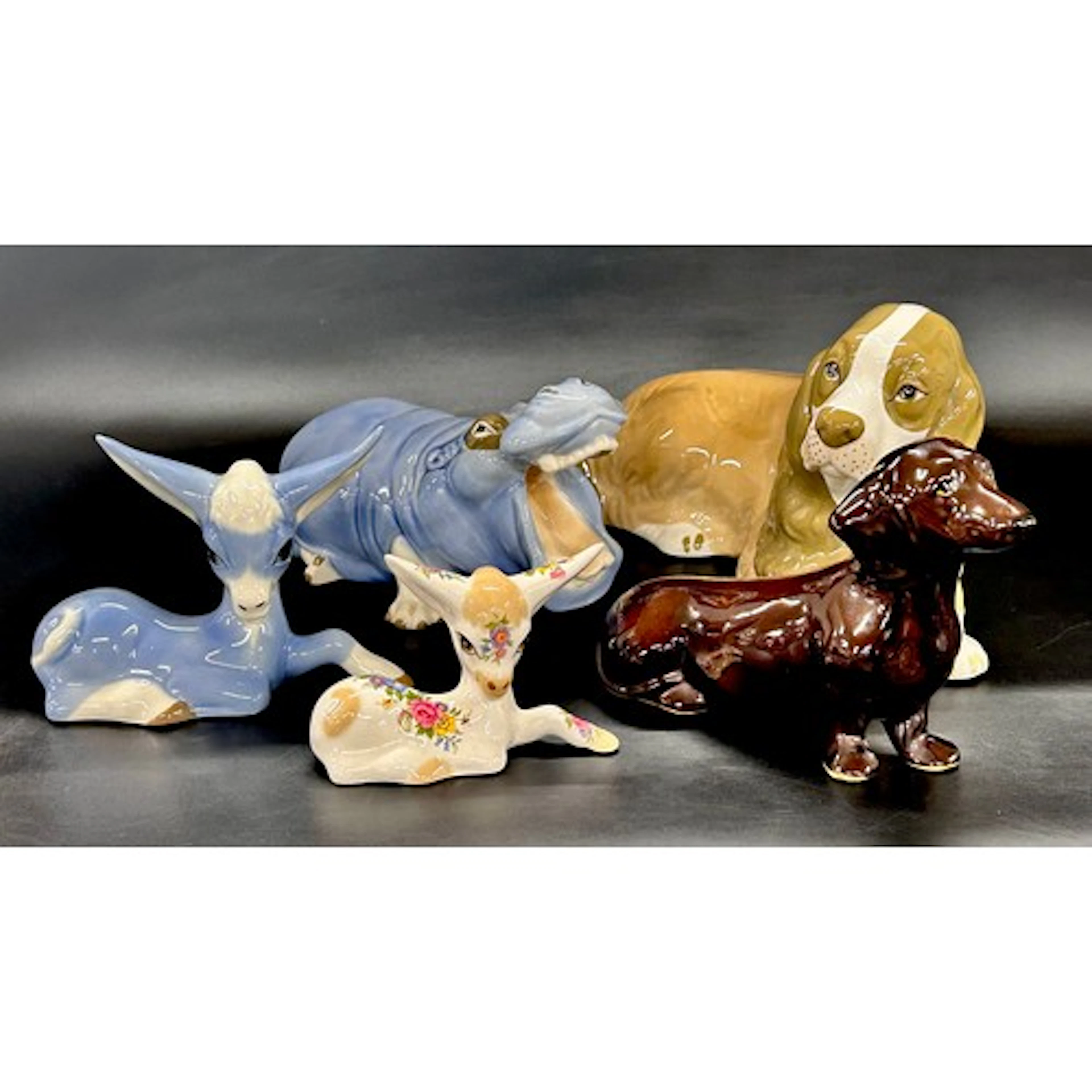 Five Szeiler Studio animal figures, hippo, dogs and deer
