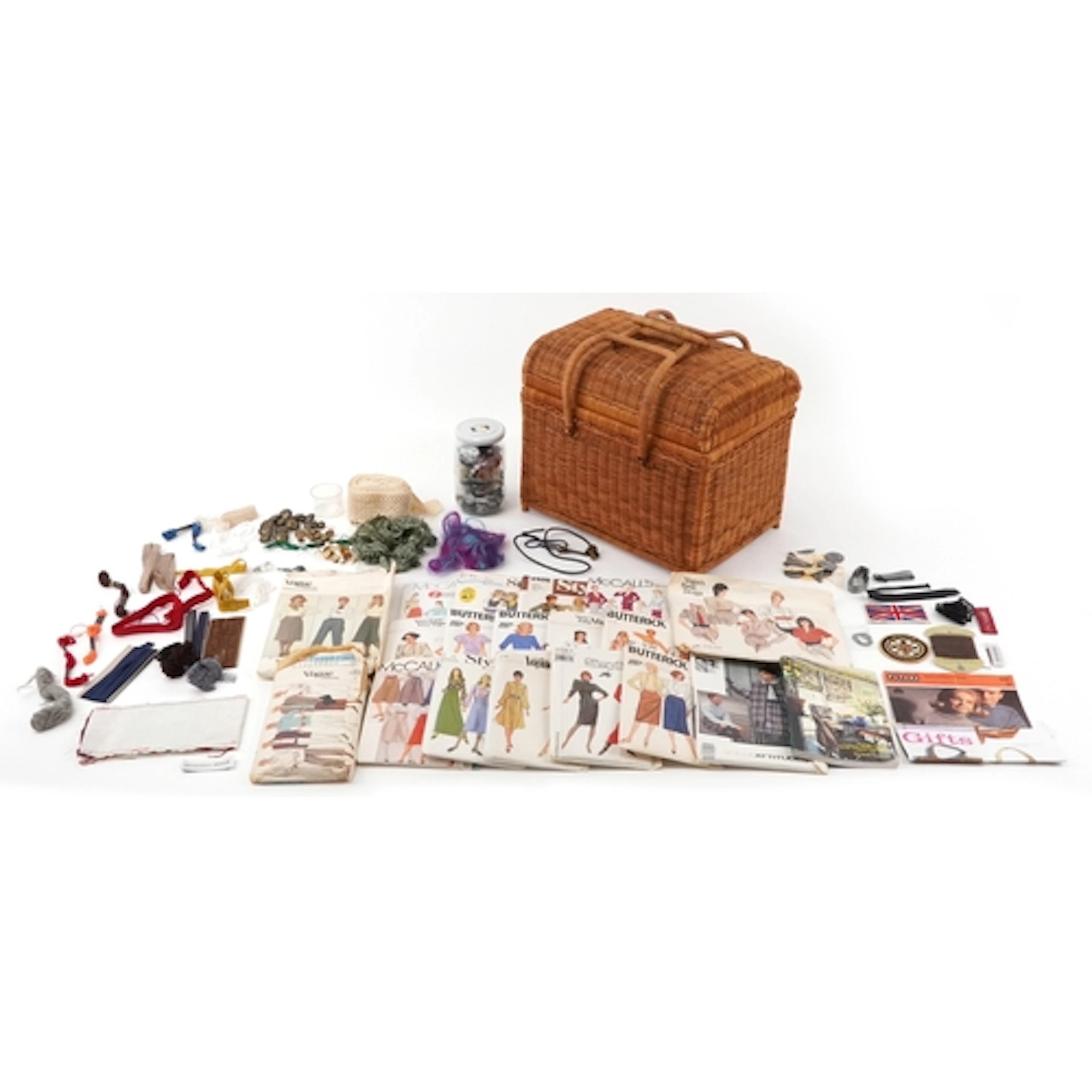 Vintage sewing items including buttons, patterns and designs...