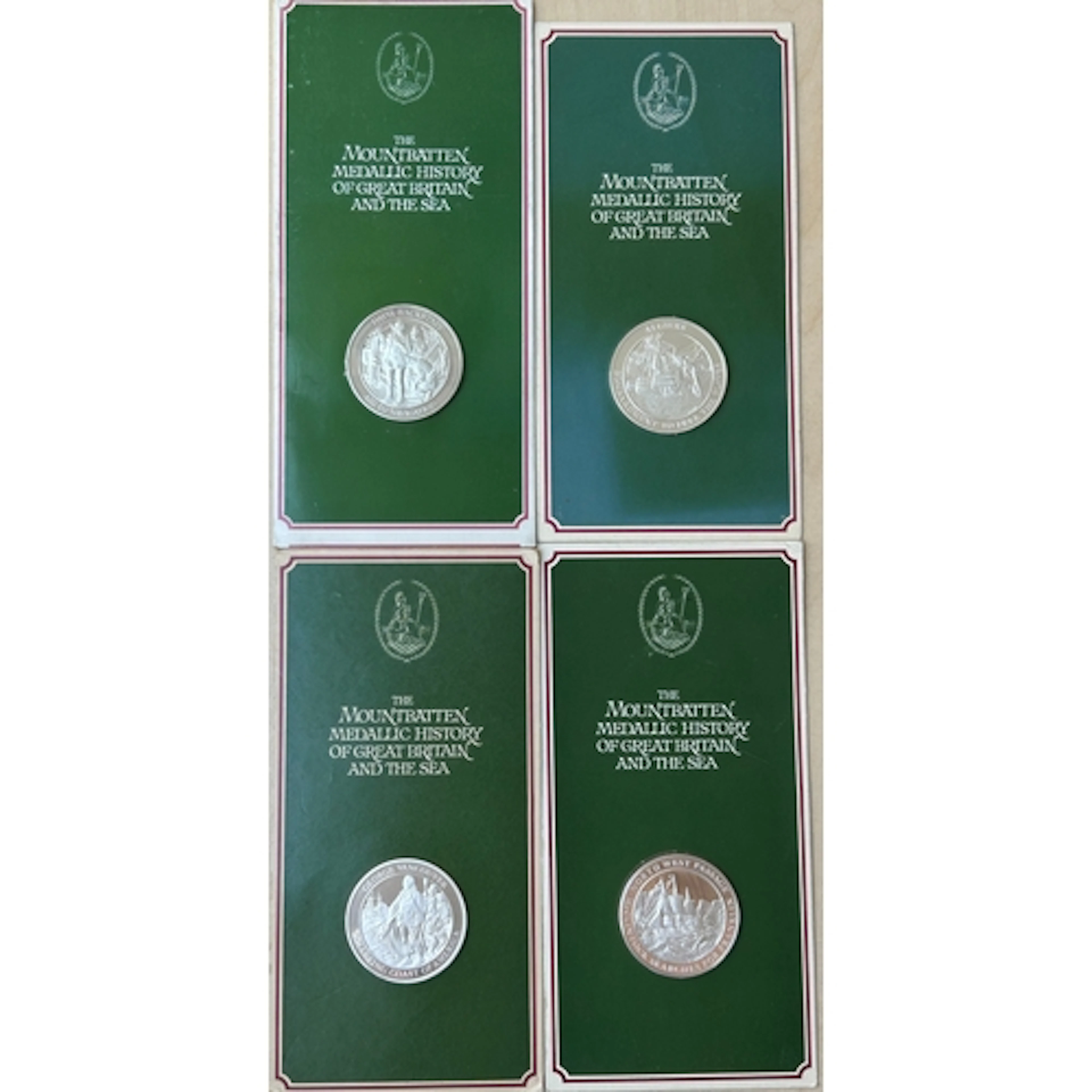 A group of four silver medallions from the 1974 Mountbatten ...