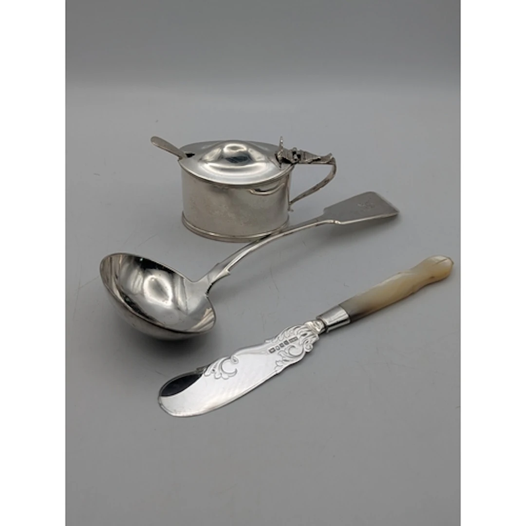 Silver to include a lidded mustard pot, A/F, having a blue g...