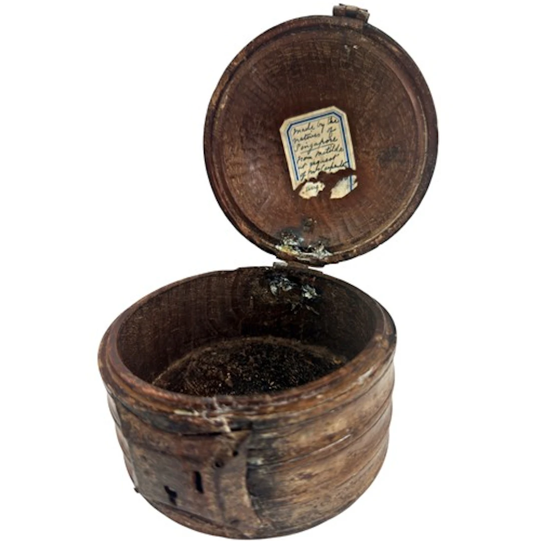 A rare and unusual small hardwood betel box of cylindrical f...