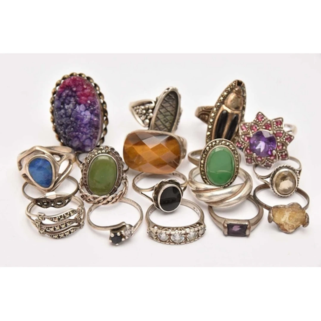 AN ASSORTMENT OF WHITE METAL RINGS, two include two hallmark...