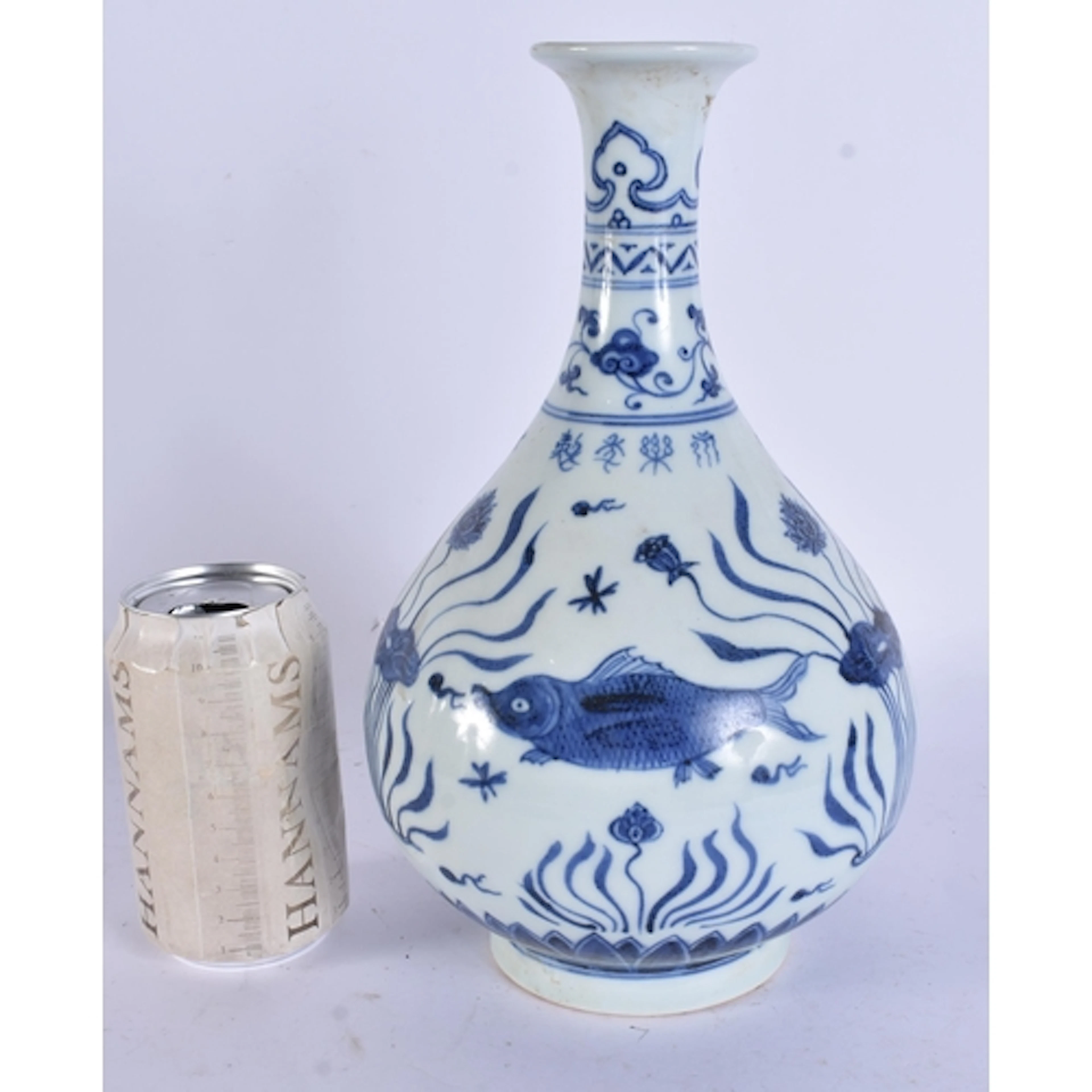A CHINESE BLUE AND WHITE PORCELAIN FISH VASE. 27.5 cm high.