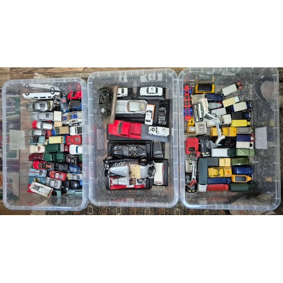 Three boxes of assorted model vehicles to include Corgi, Din...