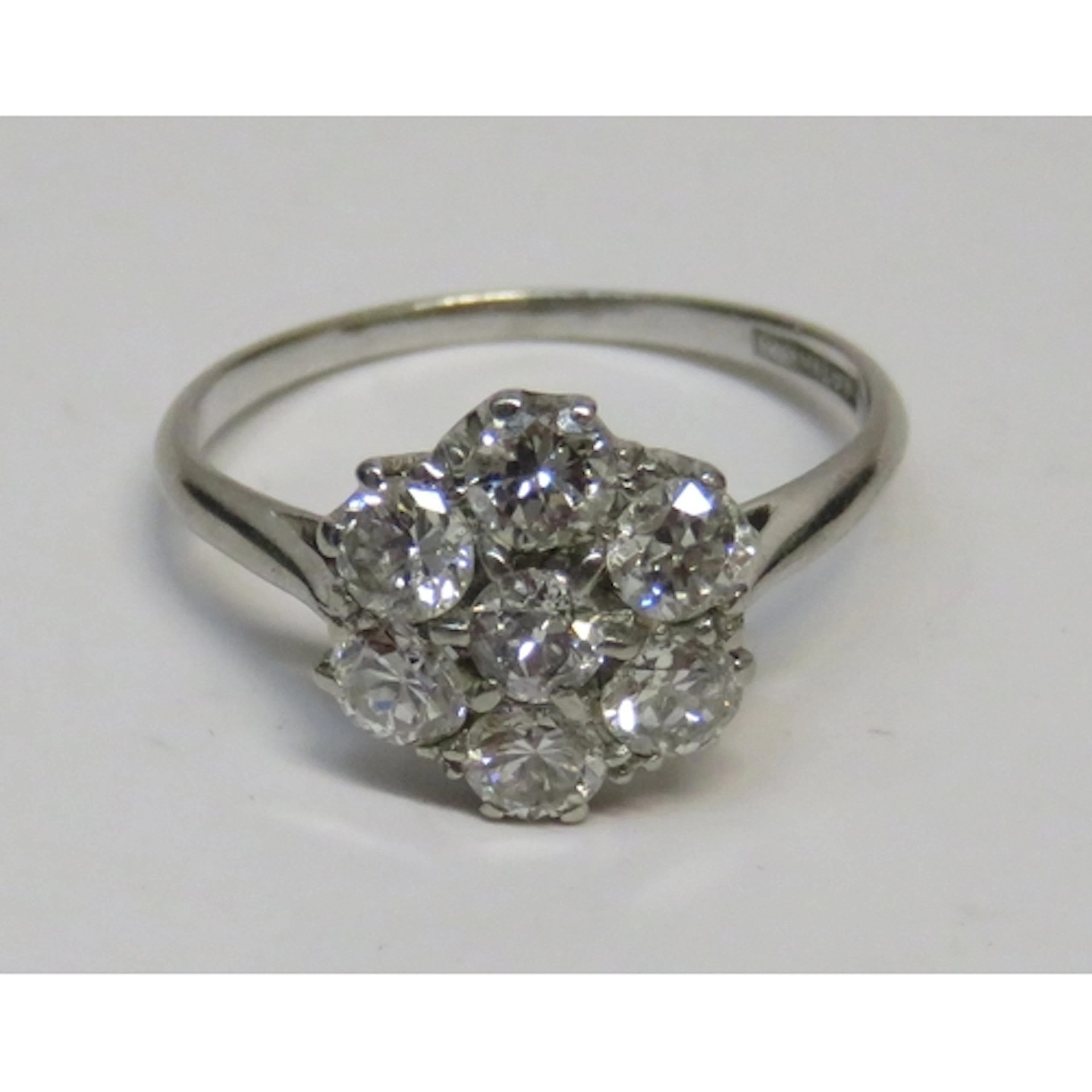 Platinum seven stone brilliant cut diamond cluster ring, siz...
