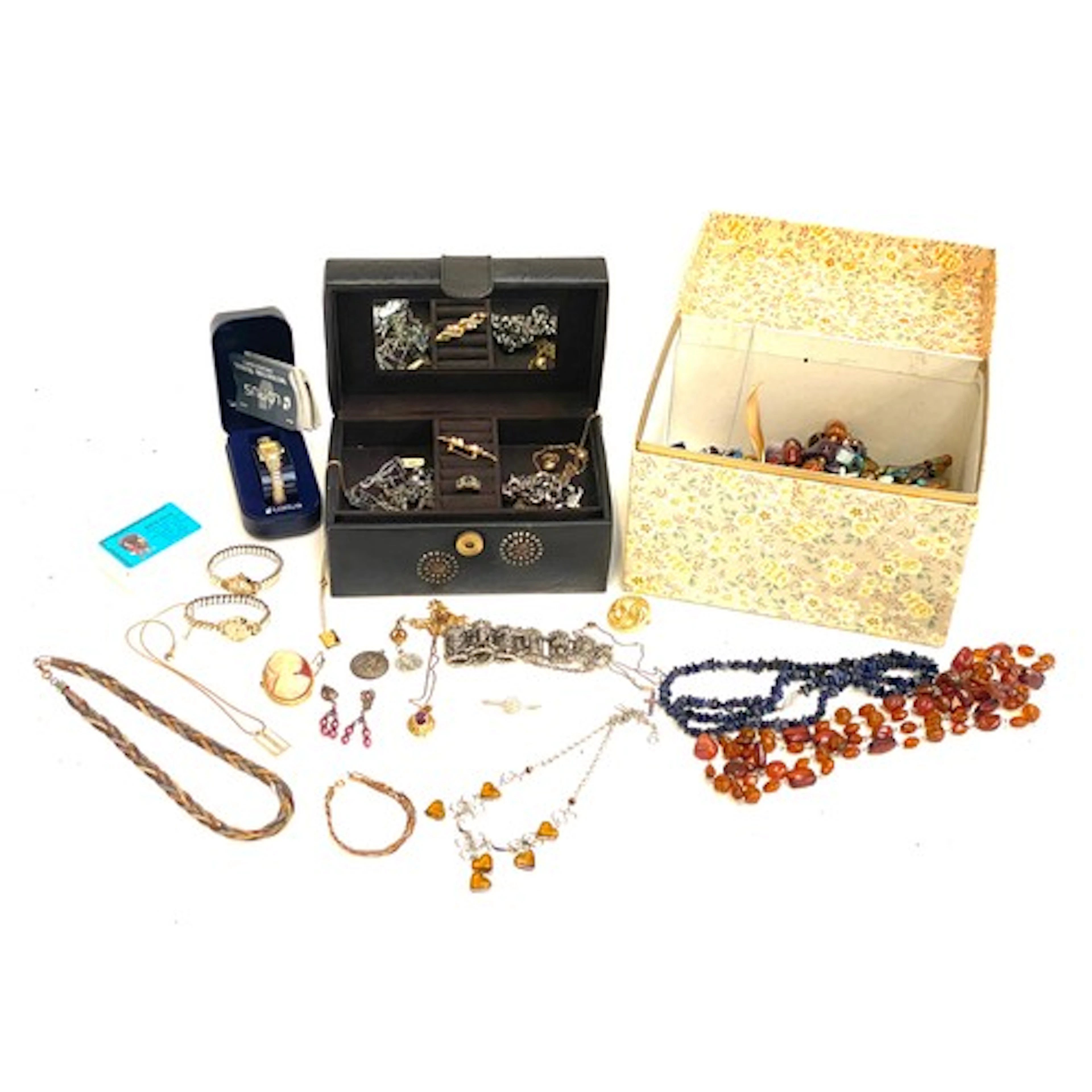 A mixed lot of costume jewellery to include a silver St. Chr...