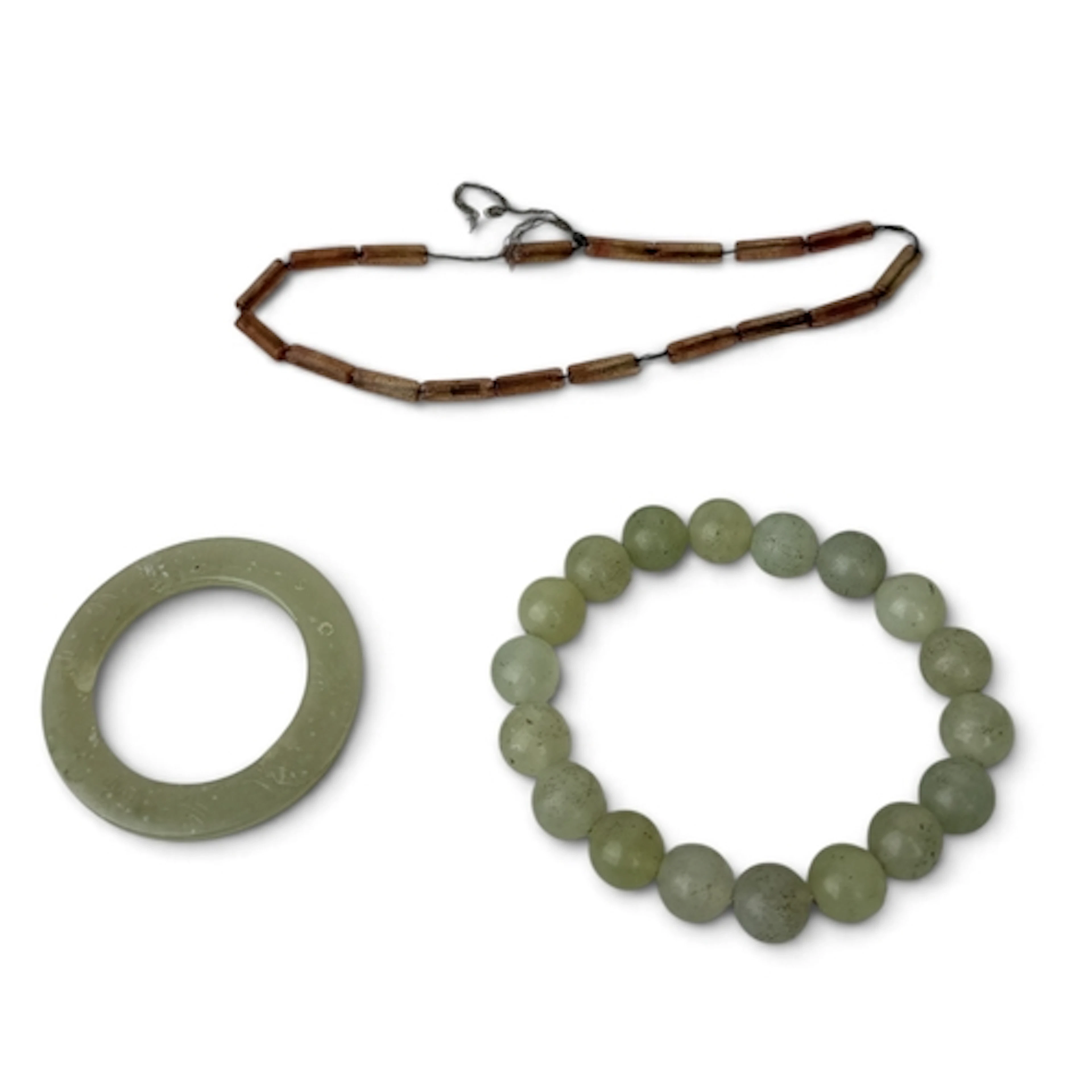 A CHINESE JADE BRACELET, DISC AND ANOTHER BRACELET