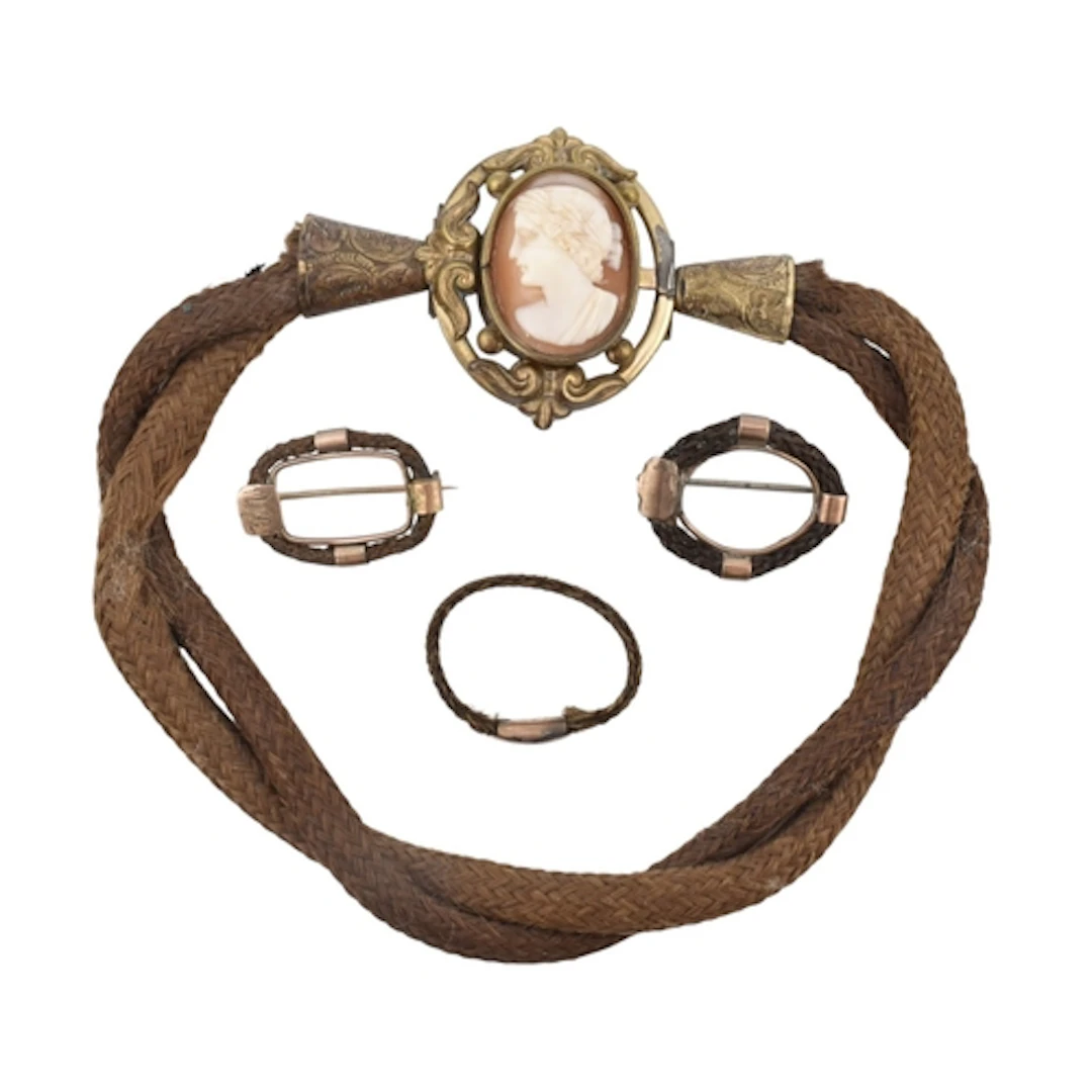 Collection of Victorian woven brown hair mourning jewellery....