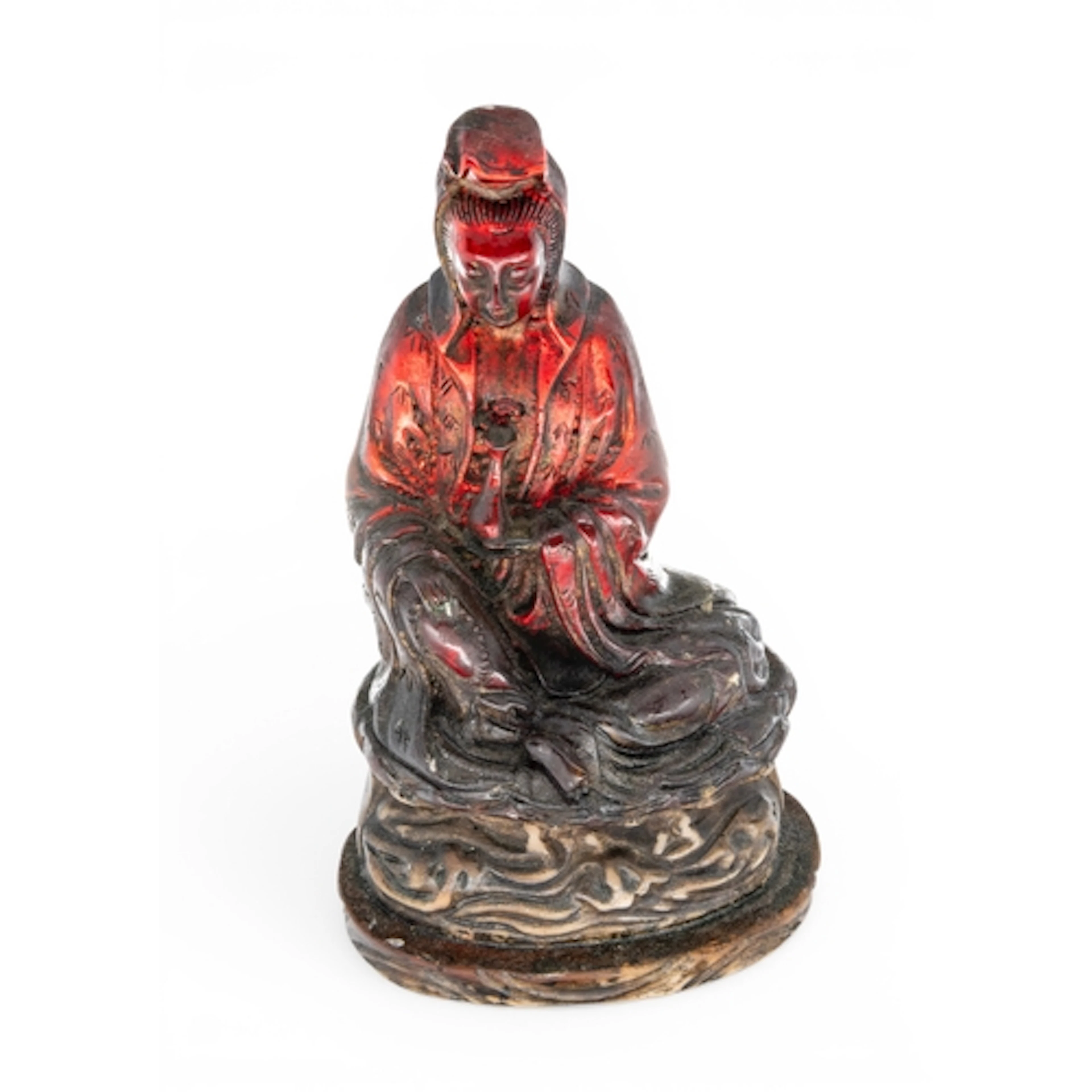 A SIMULATED-AMBER FIGURE OF GUANYIN 20TH CENTURY 21cm high...