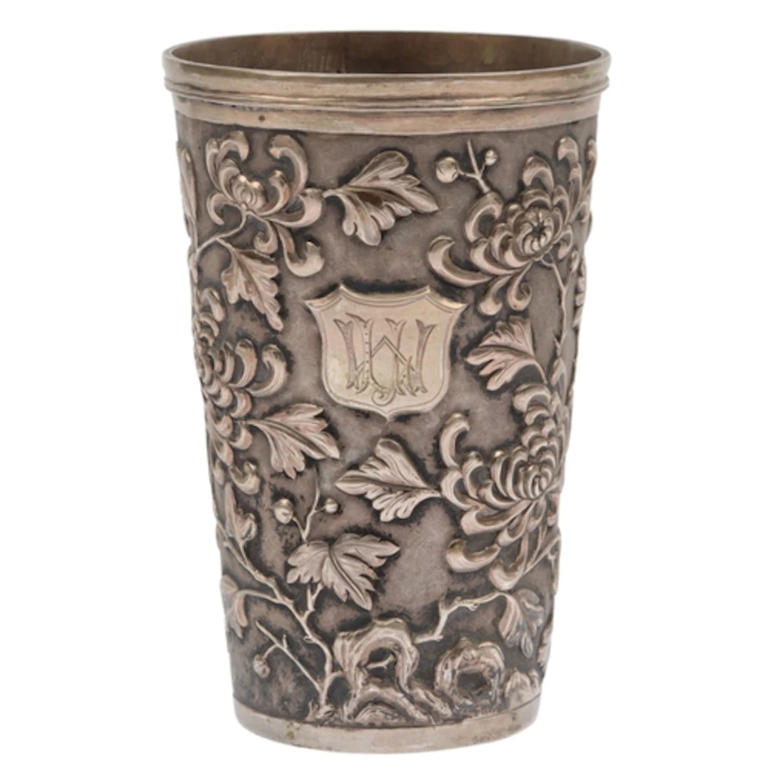 A Chinese Straits repousse white metal beaker, decorated wit...
