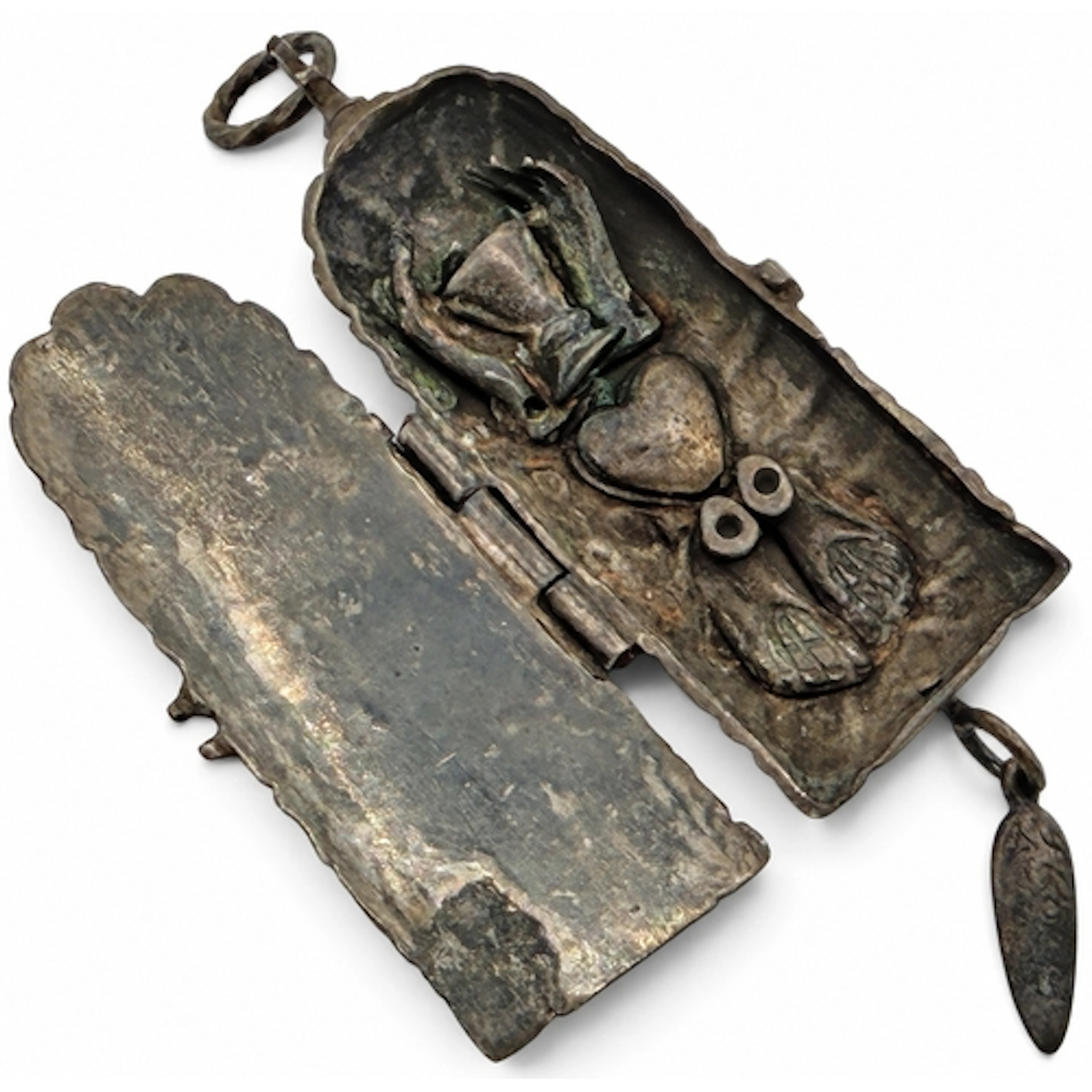 A Continental silver devotional pendant depicting the Arma C...